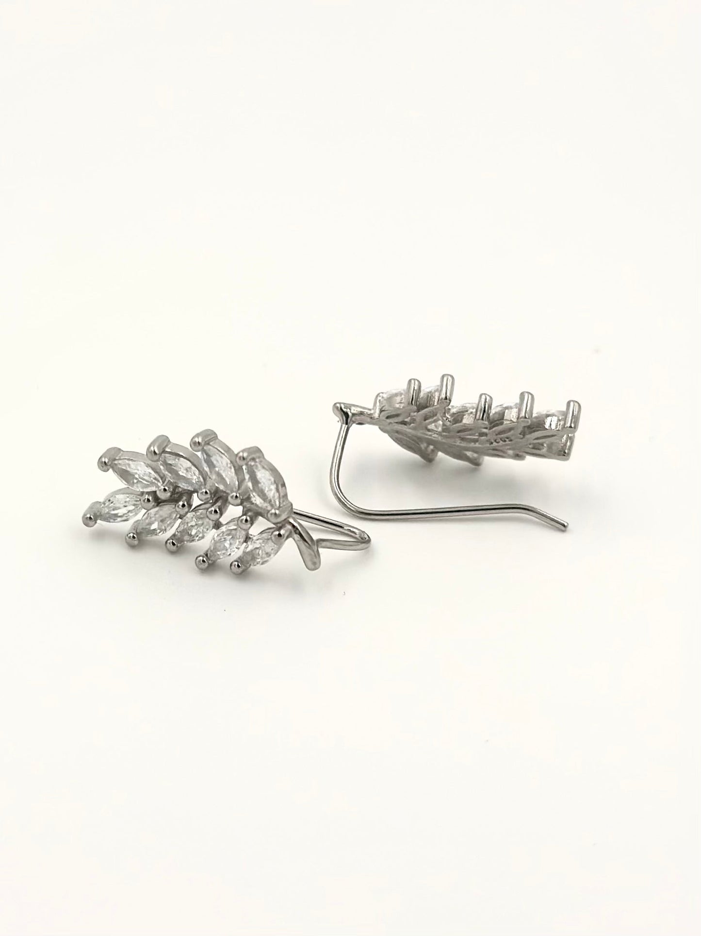 Sterling silver drop earrings in leaf shape, studded with zircon