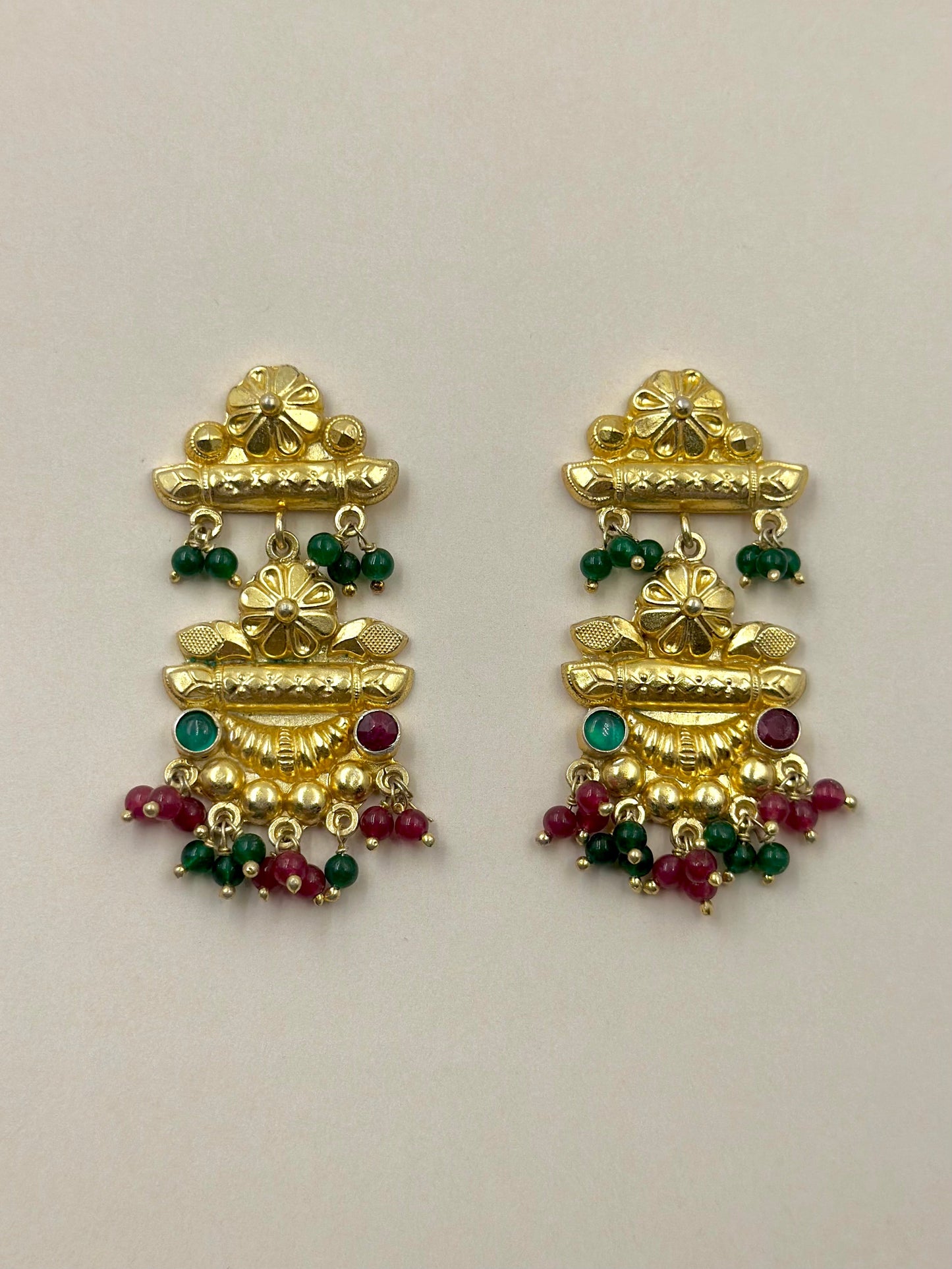 Gold plated, studded with green and red stones, sterling silver danglers