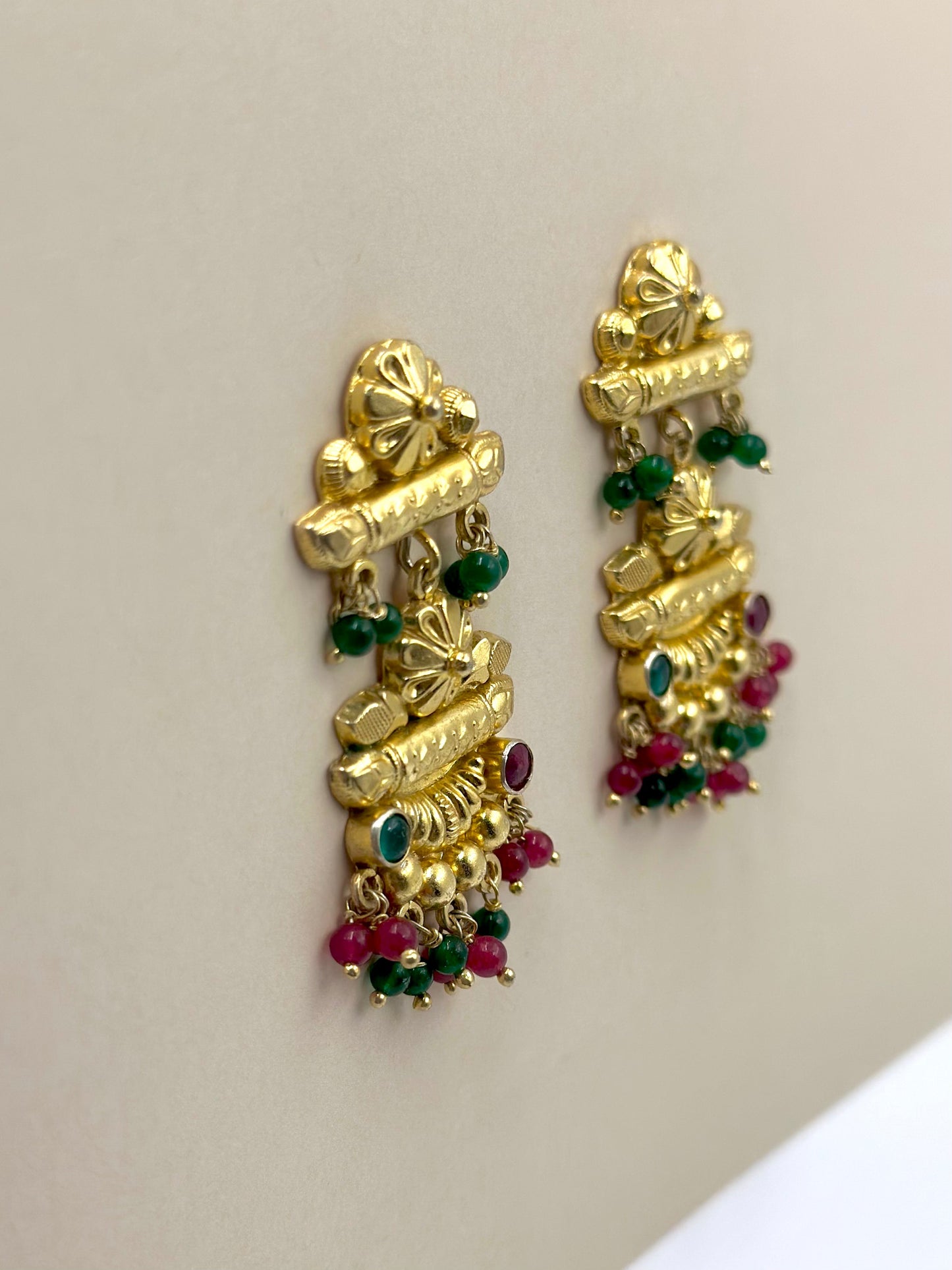 Gold plated, studded with green and red stones, sterling silver danglers