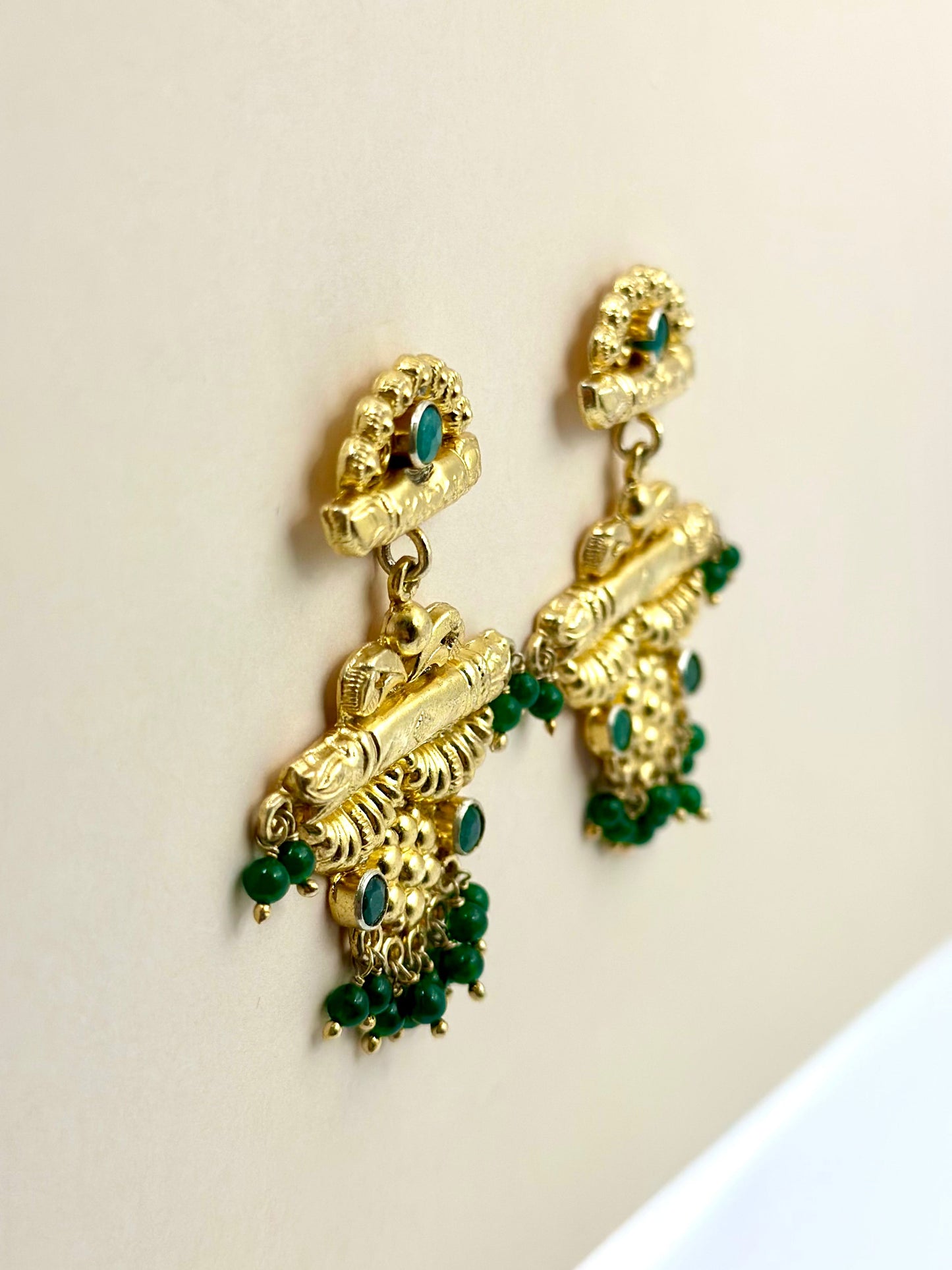 Gold plated, studded with green stones, sterling silver danglers