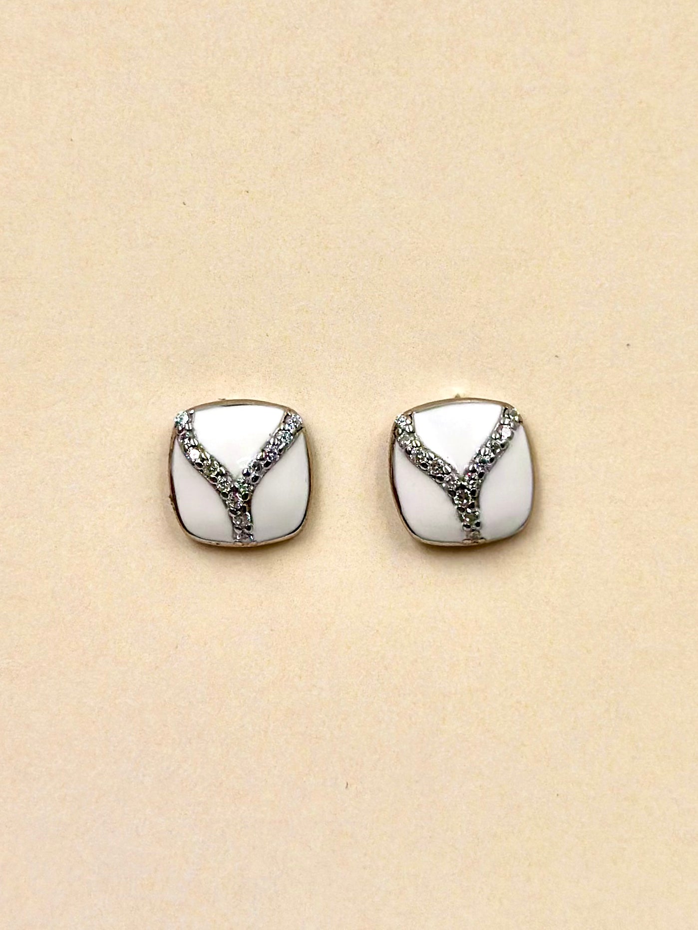 Enamel decorated, zircon studded, V sign studs in sterling silver