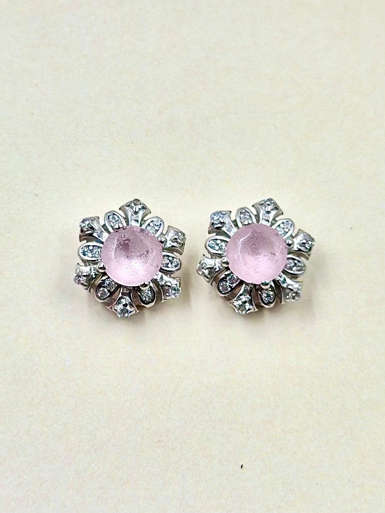Zircon studded, flower shaped, sterling silver studs with pink jade stone