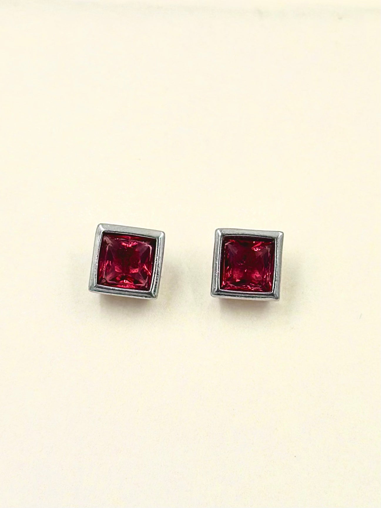 Red stone studded, square shaped, sterling silver studs