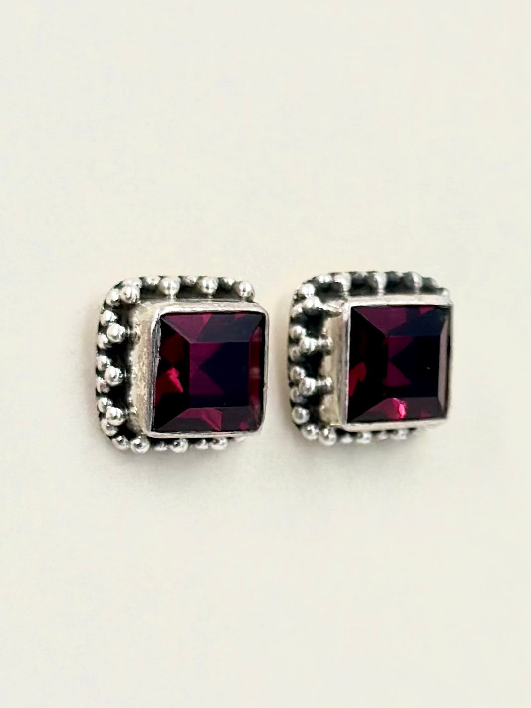 Red stone studded, oxidised, square shaped, sterling silver studs