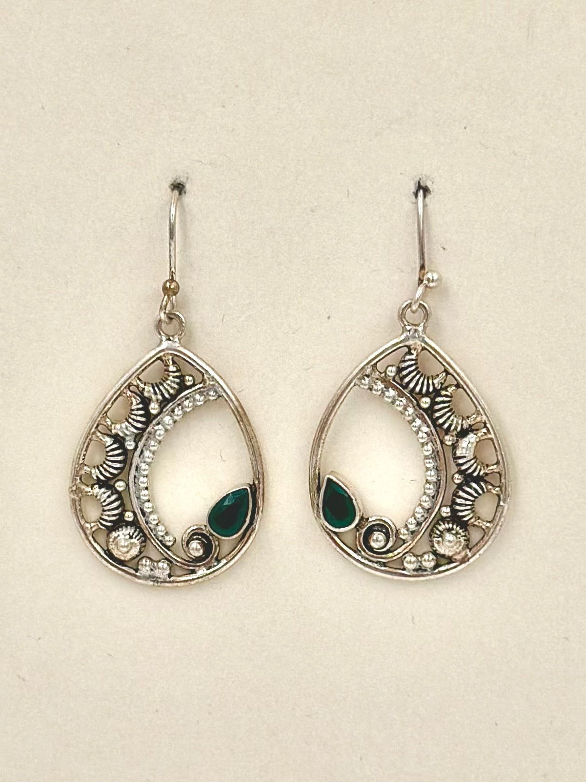 Lavish, oxidesed, studded with zircon and fancy stones, sterling silver drop earrings