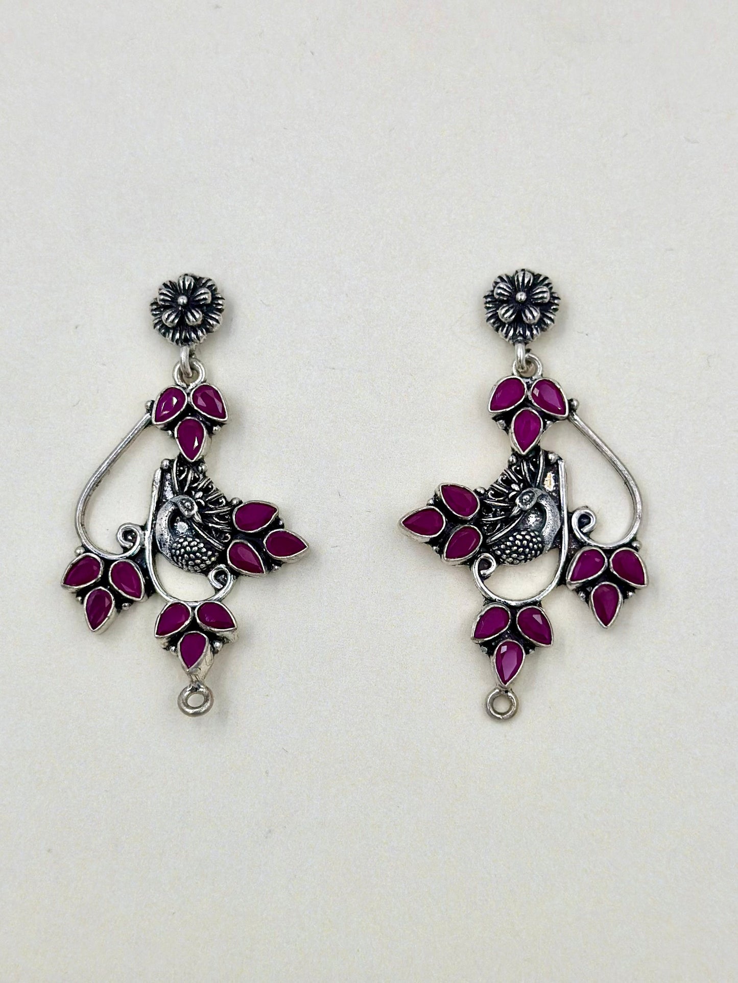 fancy stones studded, peacock shaped, oxidised sterling silver danglers