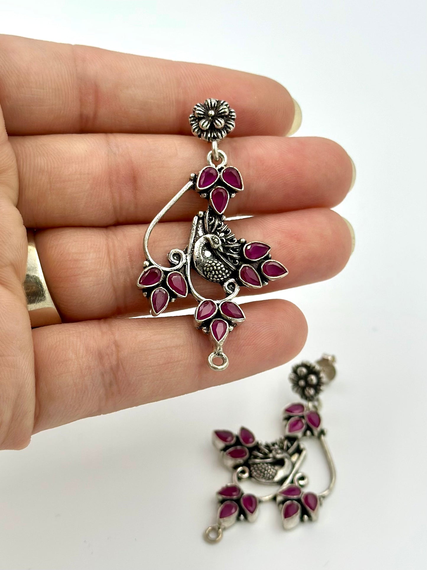 fancy stones studded, peacock shaped, oxidised sterling silver danglers