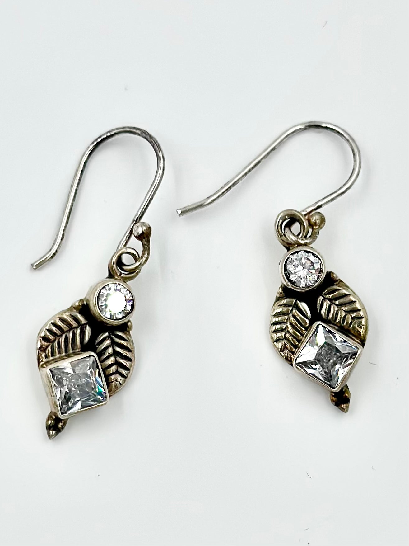 Zircon studded, leaf shaped, oxidised, sterling silver drop earrings