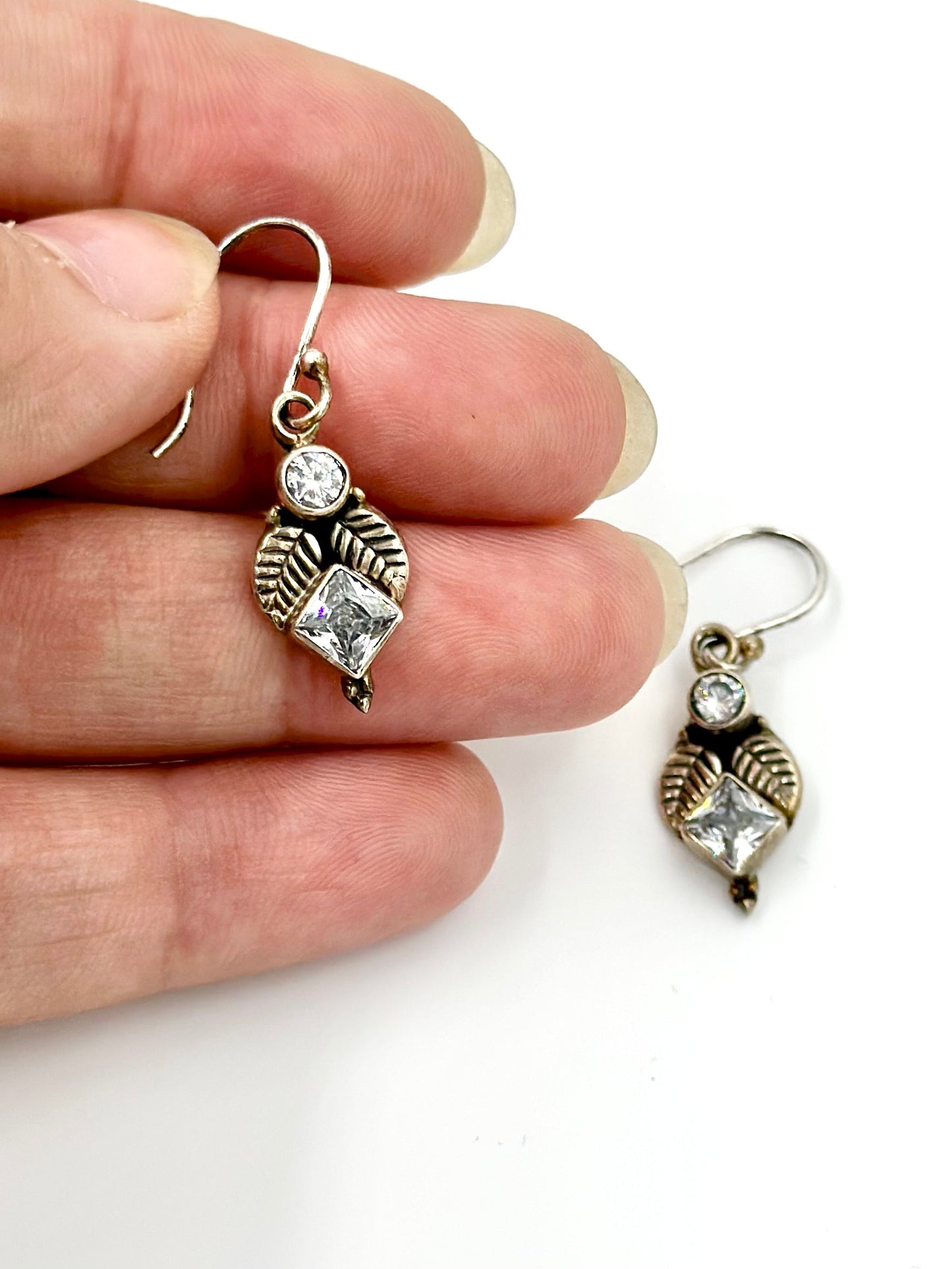 Zircon studded, leaf shaped, oxidised, sterling silver drop earrings