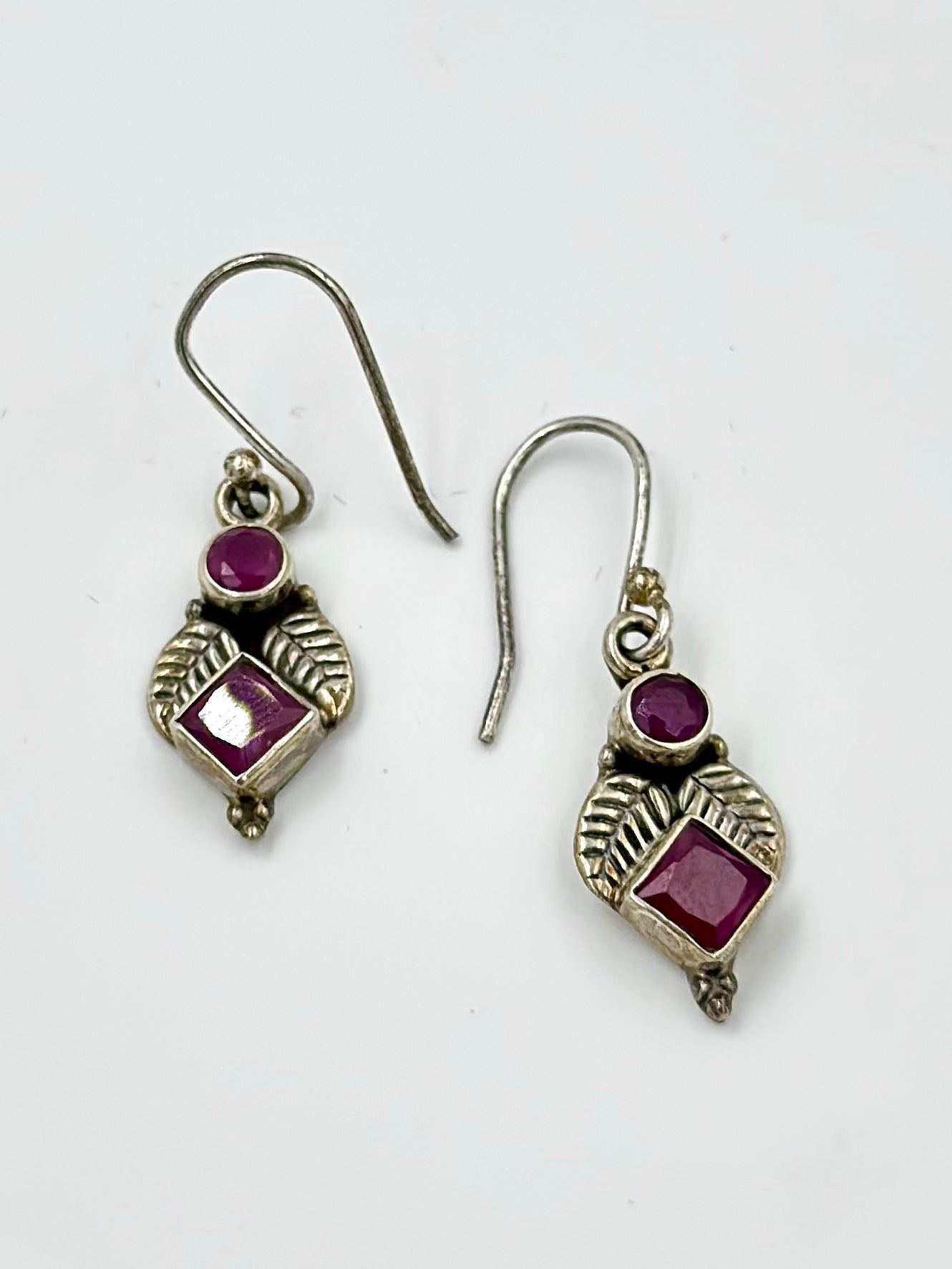 Red stone studded, leaf shaped, oxidised, sterling silver drop earrings