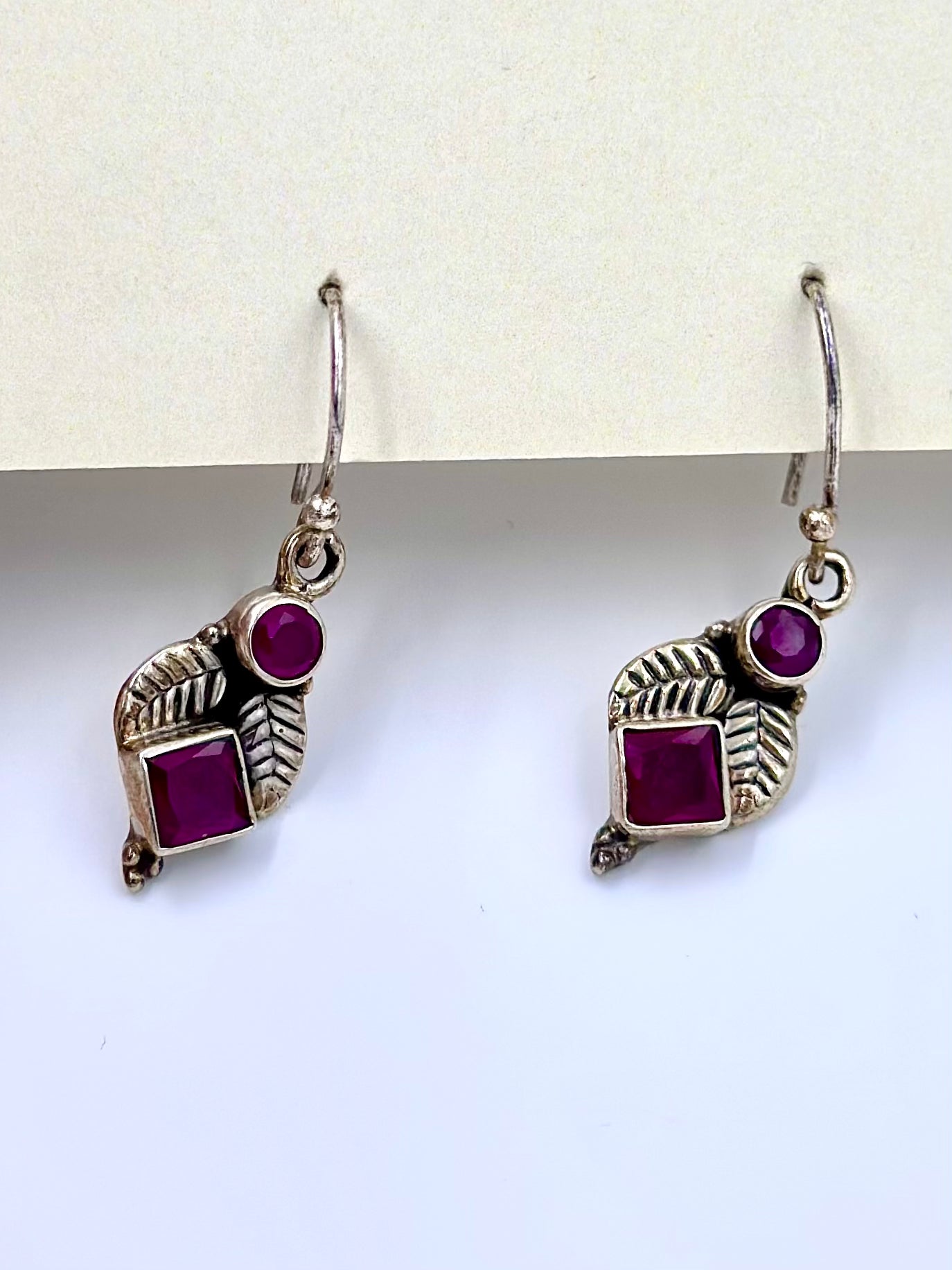 Red stone studded, leaf shaped, oxidised, sterling silver drop earrings