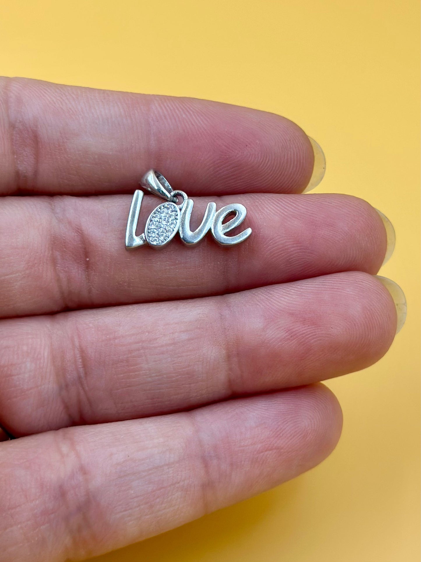 Zircon studded sterling silver pendant