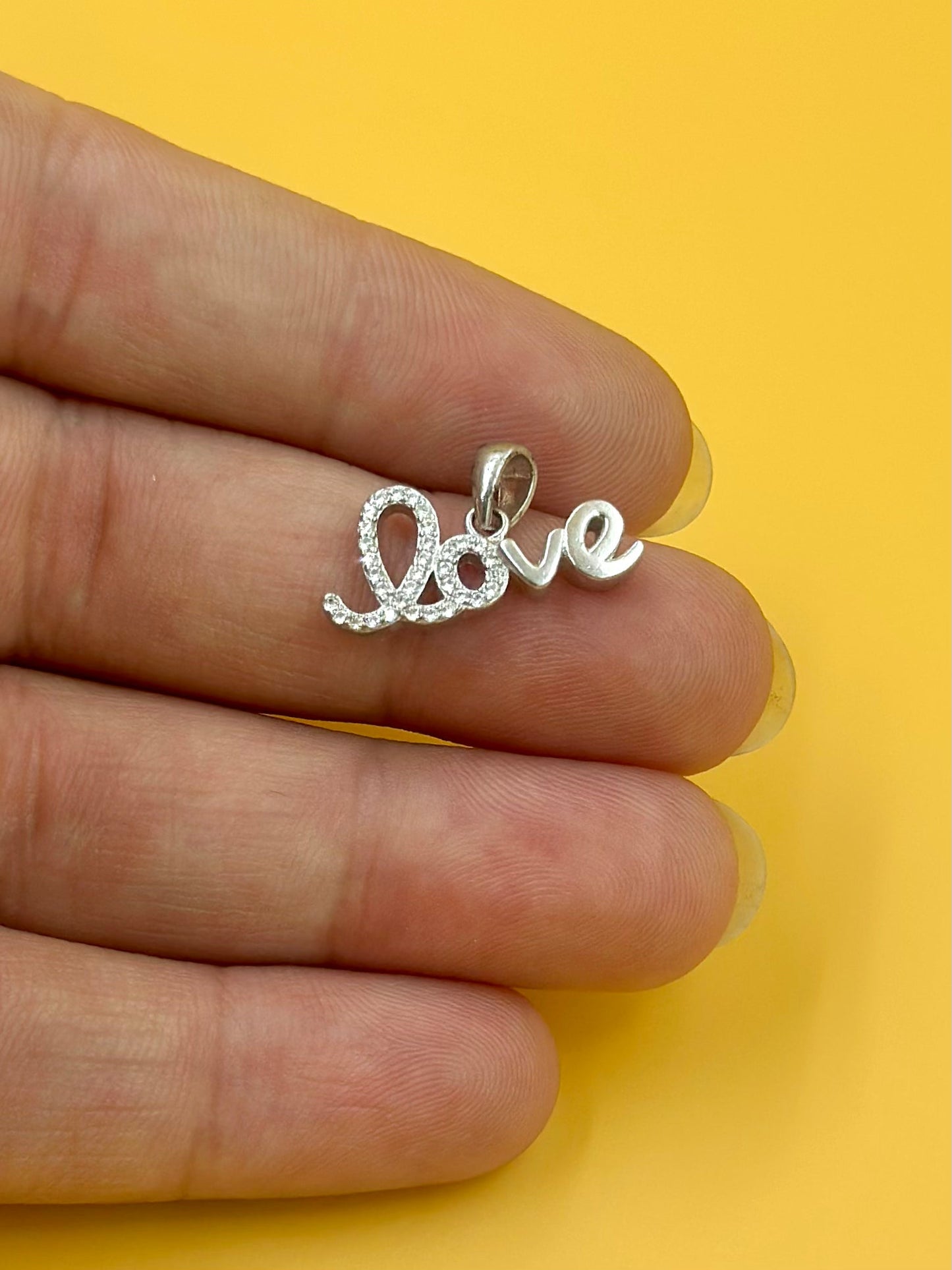 Zircon studded sterling silver pendant