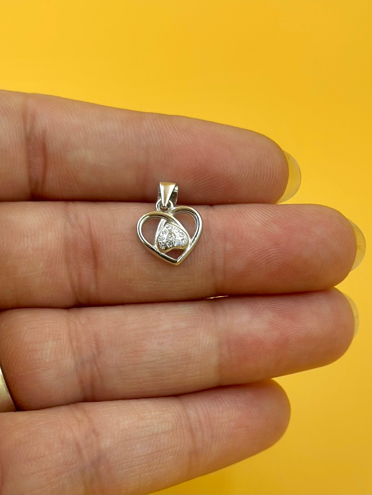 Zircon studded, heart shaped sterling silver pendant