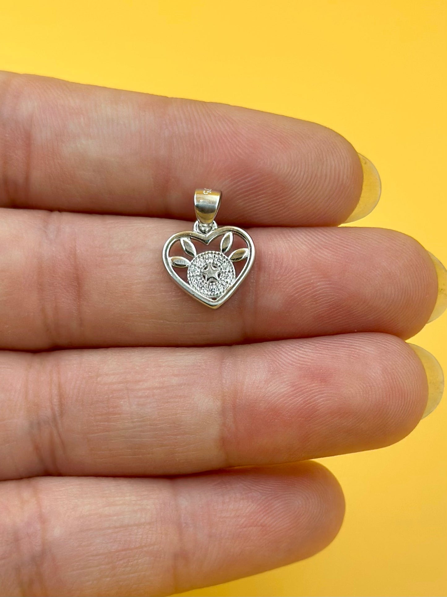 Zircon studded, heart shaped sterling silver pendant
