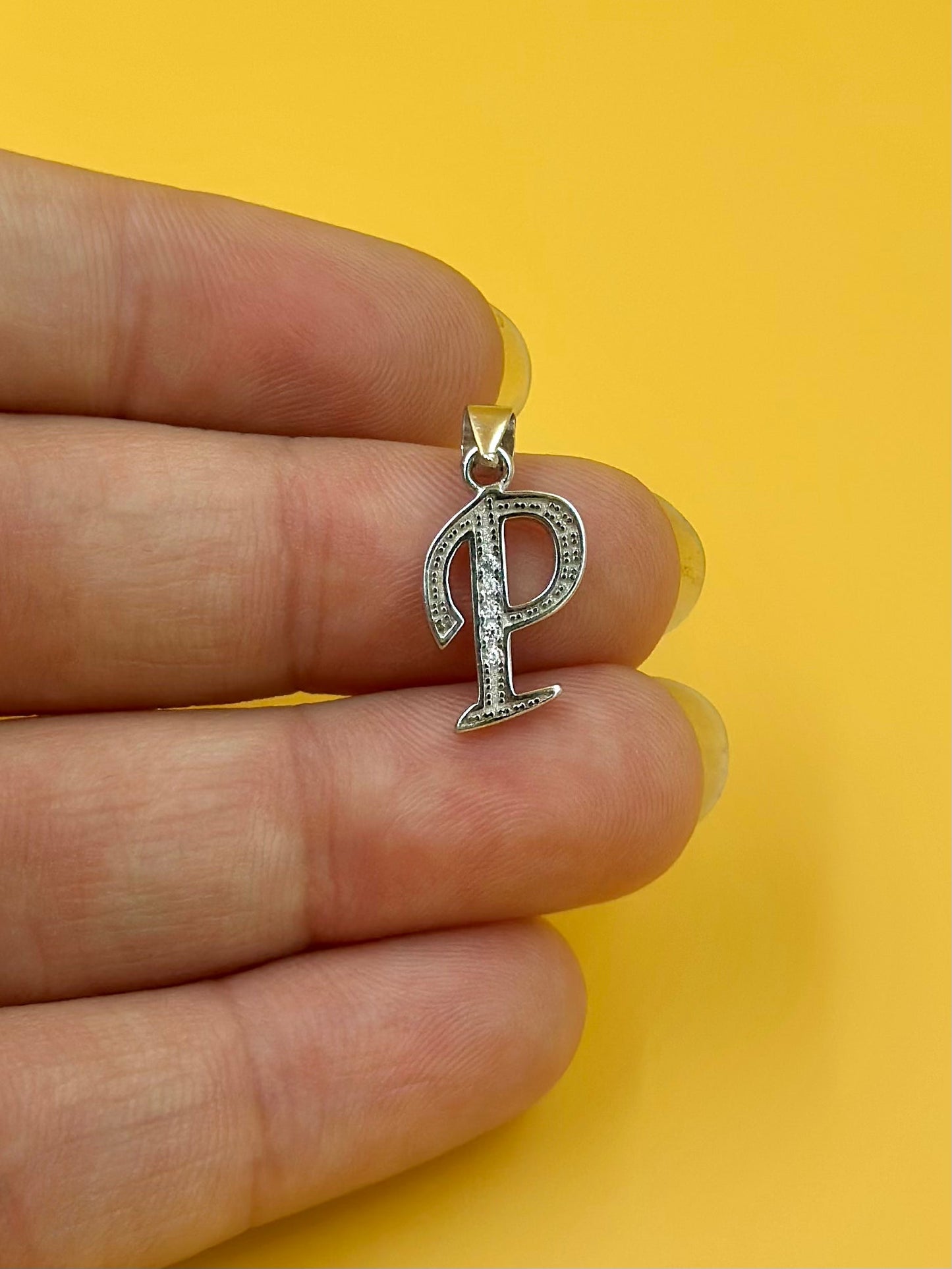 P shaped, zircon studded sterling silver pendant