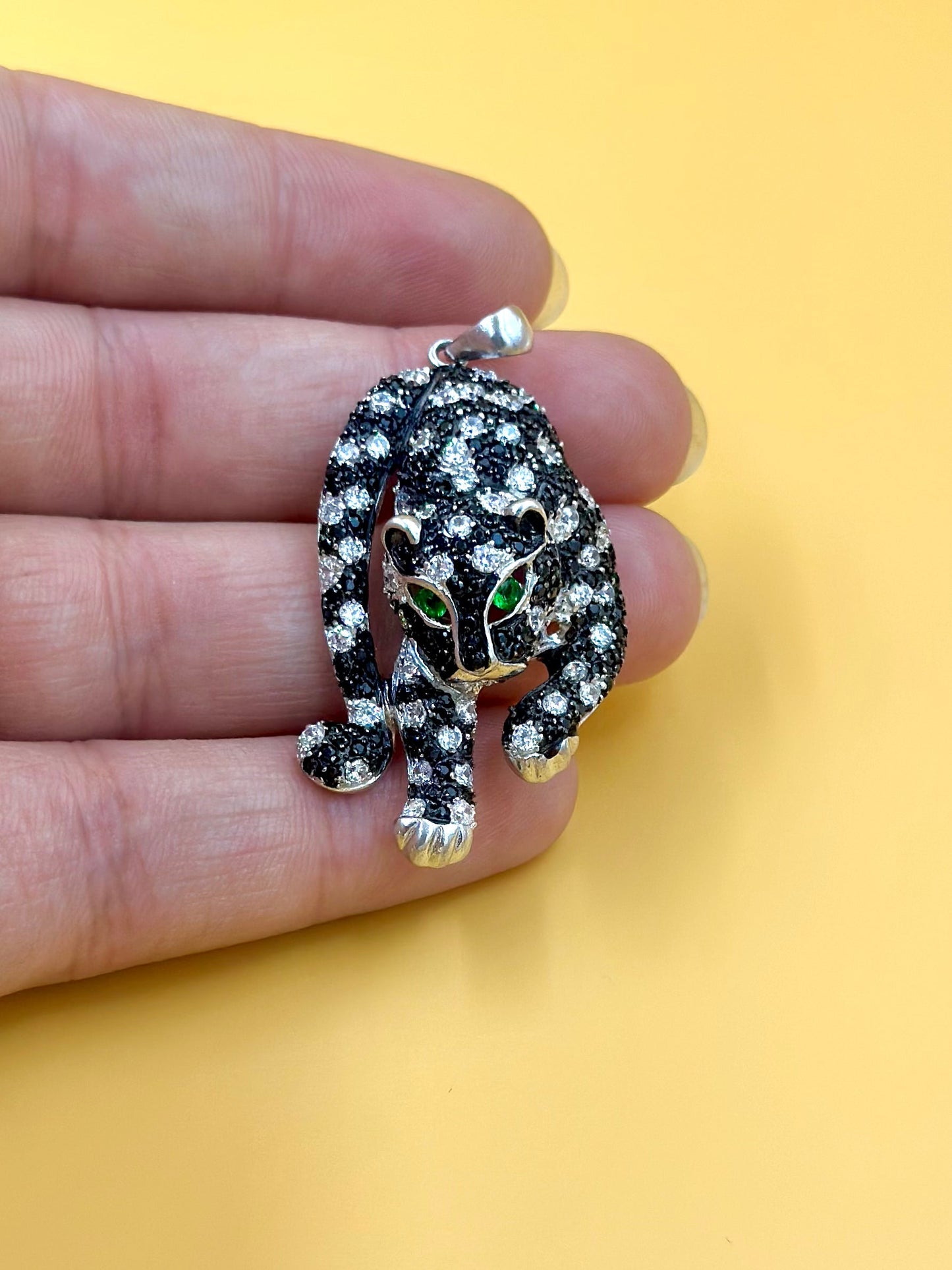 Zircon and fancy stone studded, Cartier Style, panther shaped sterling silver pendant