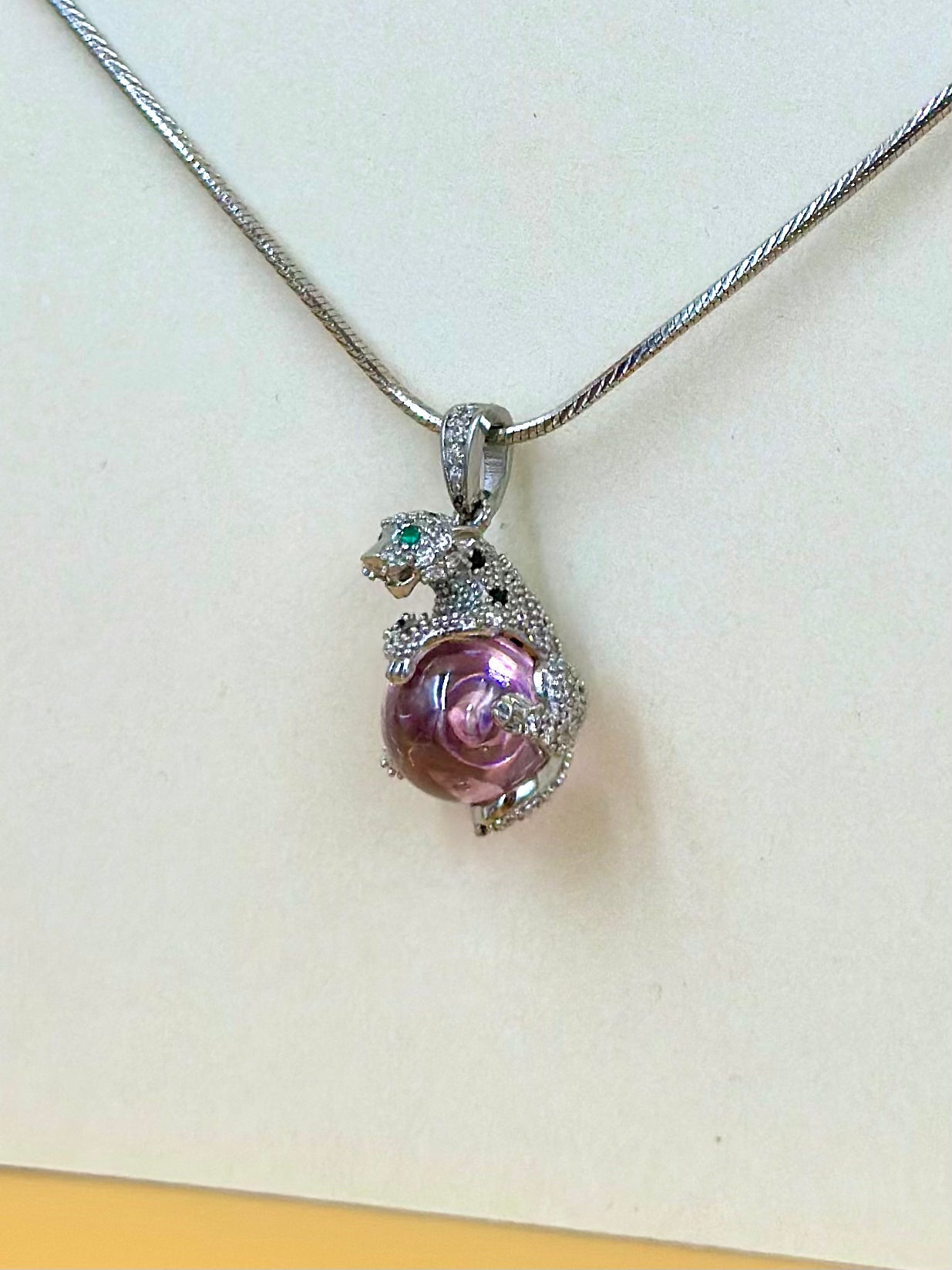 Zircon and fancy stone studded, Cartier Style, panther shaped sterling silver pendant