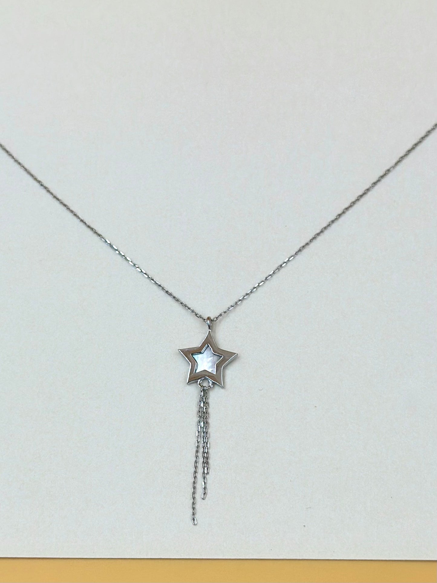 Reversible star shaped sterling silver pendant chain