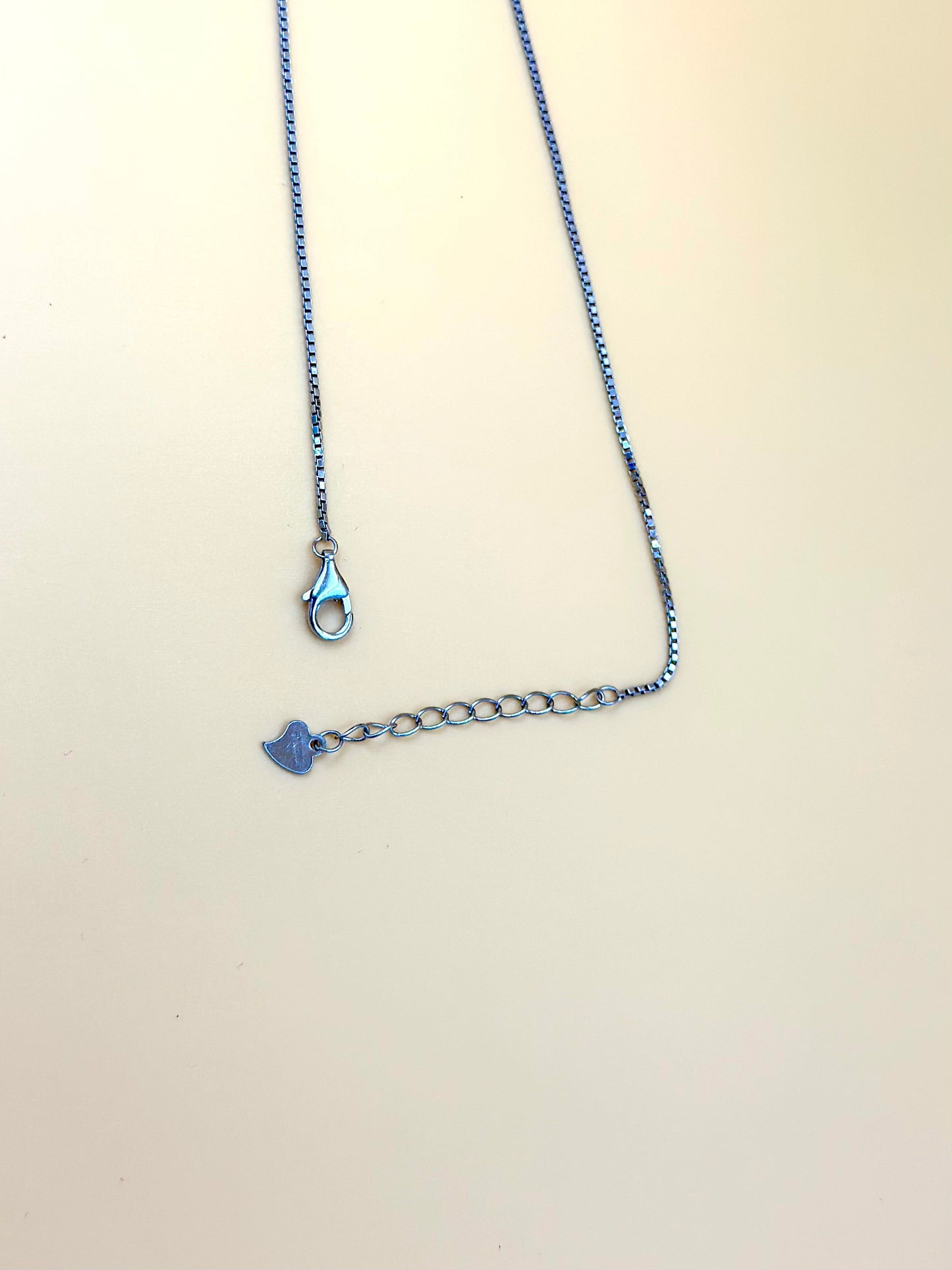 Ruby and zircon studded sterling silver pendant chain