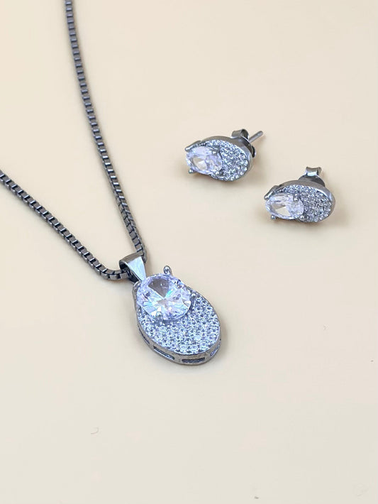 Oval shaped, zircon studded sterling silver pendant set
