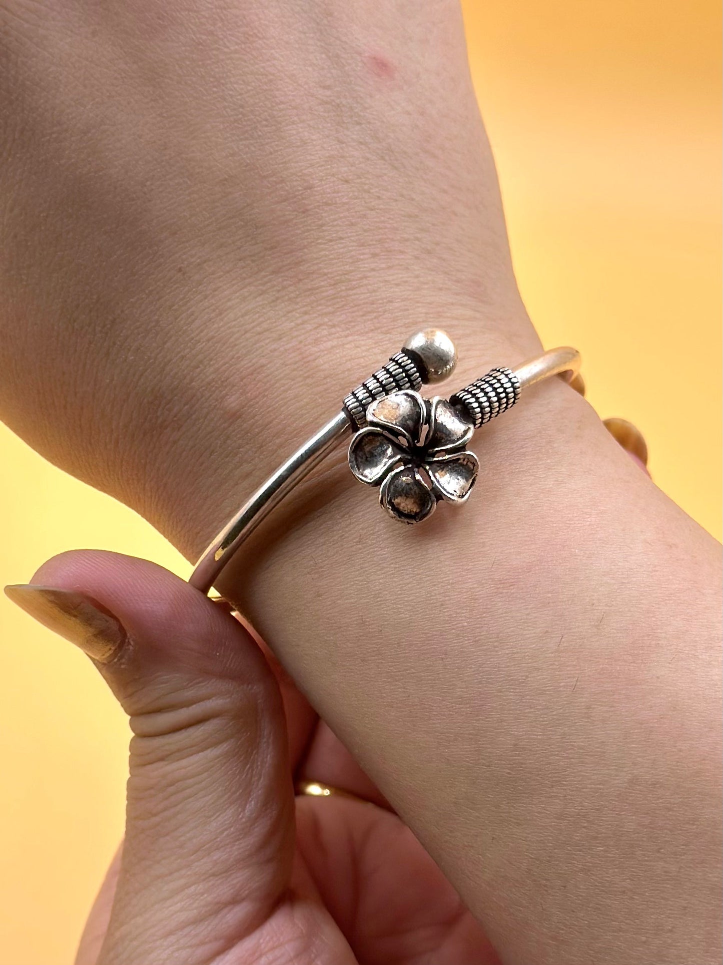 Flower shaped sterling silver cuff bracelet