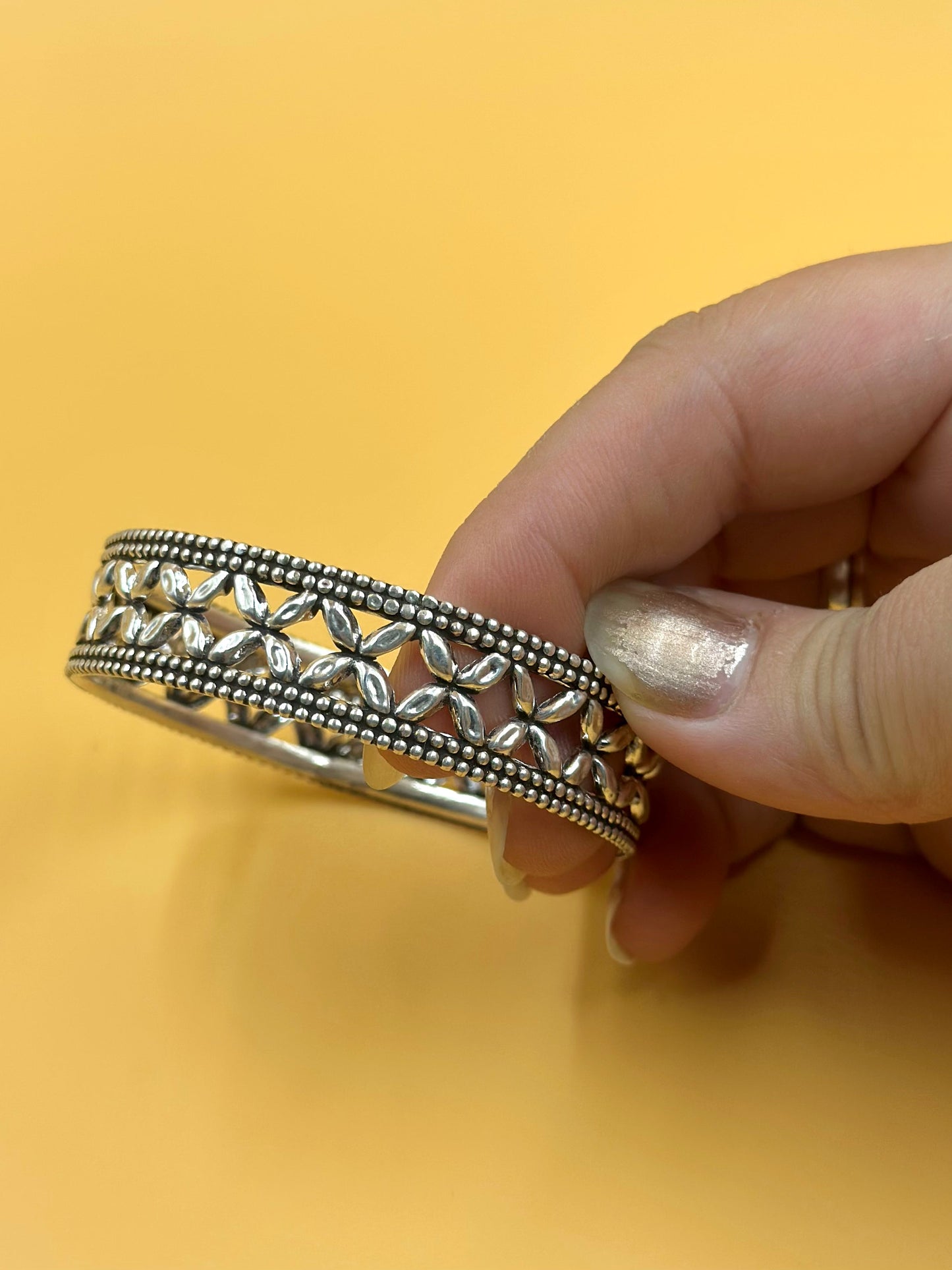 Oxidised, flower shaped sterling silver kada