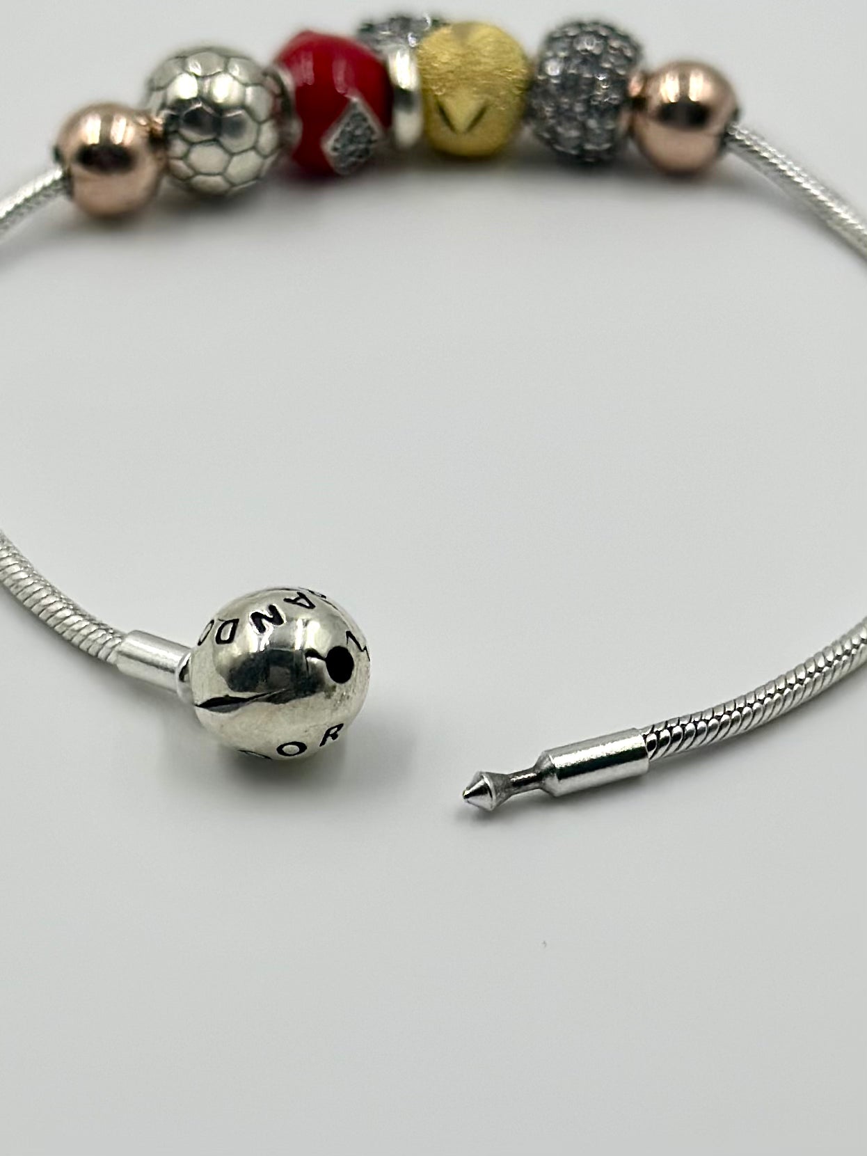 Oxidised, zircon studded, flower-circle shaped sterling silver charm bracelet