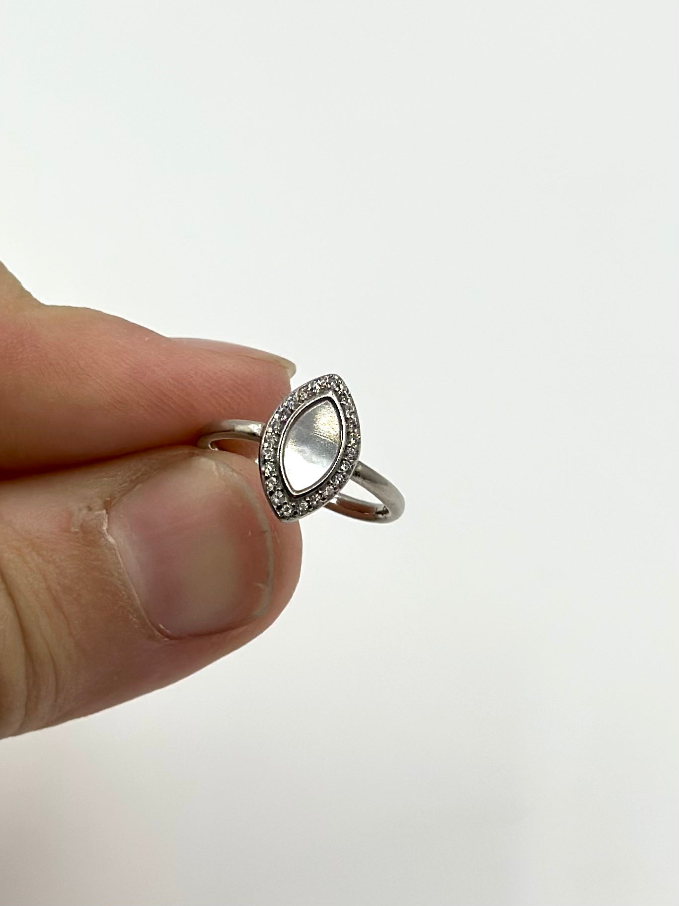 Zircon studded, oval shaped sterling silver artisanal ring