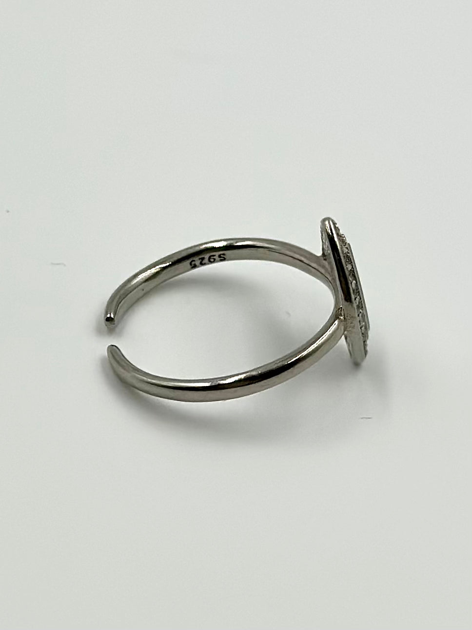 Zircon studded, oval shaped sterling silver artisanal ring