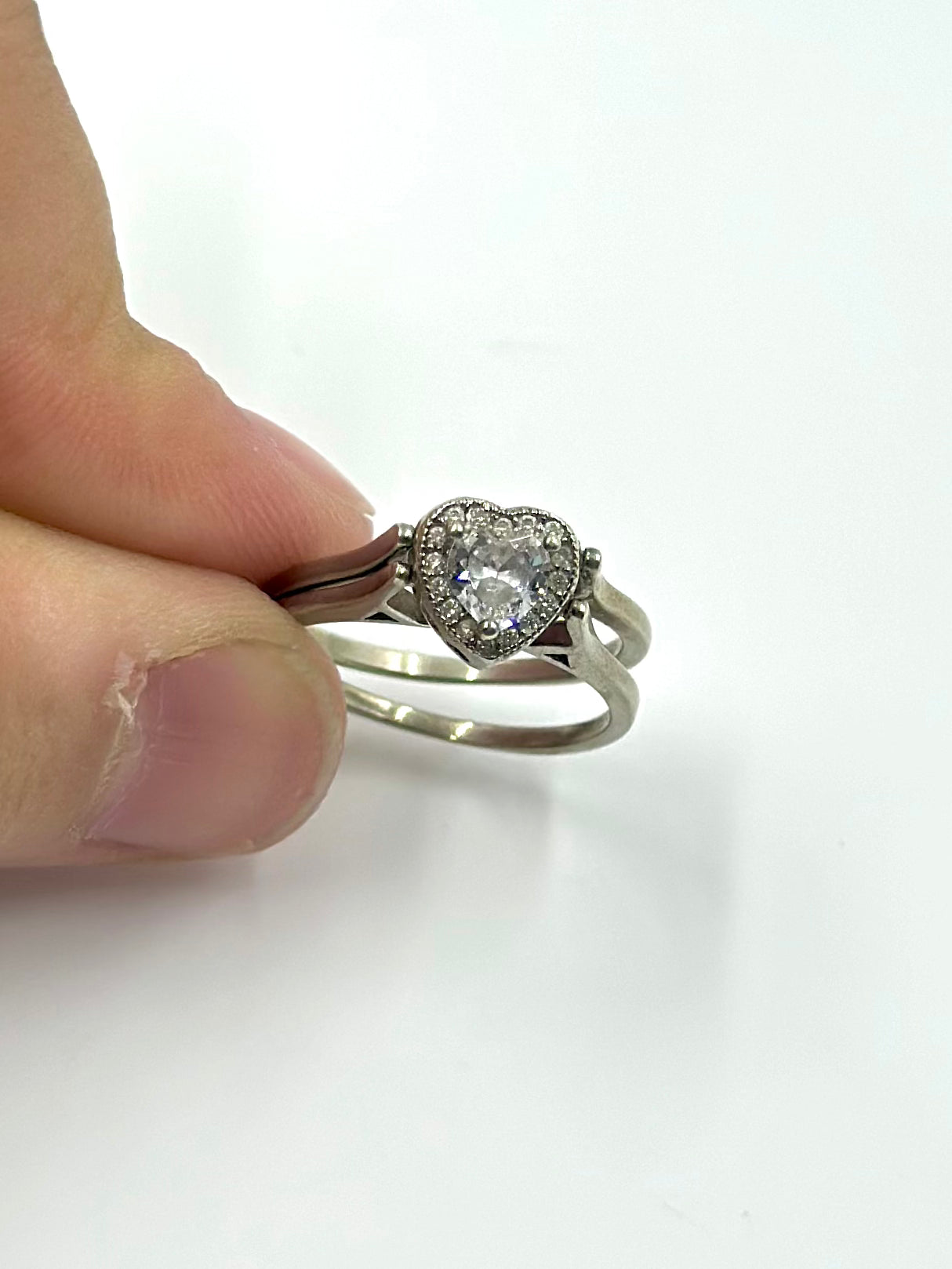 Zircon studded with a ruby, heart shaped, reversible sterling silver artisanal ring