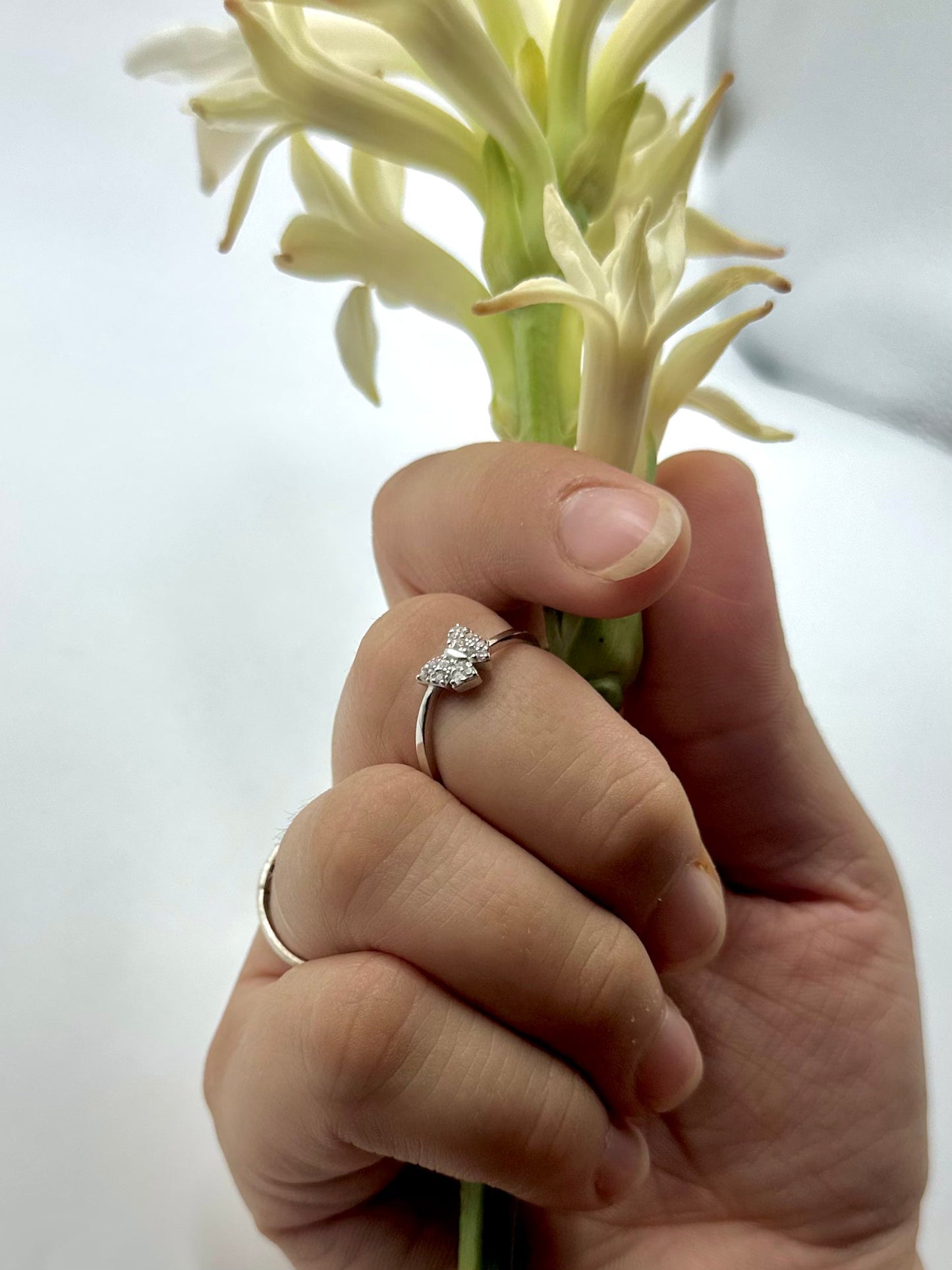 Zircon studded, butterfly shaped sterling silver artisanal ring