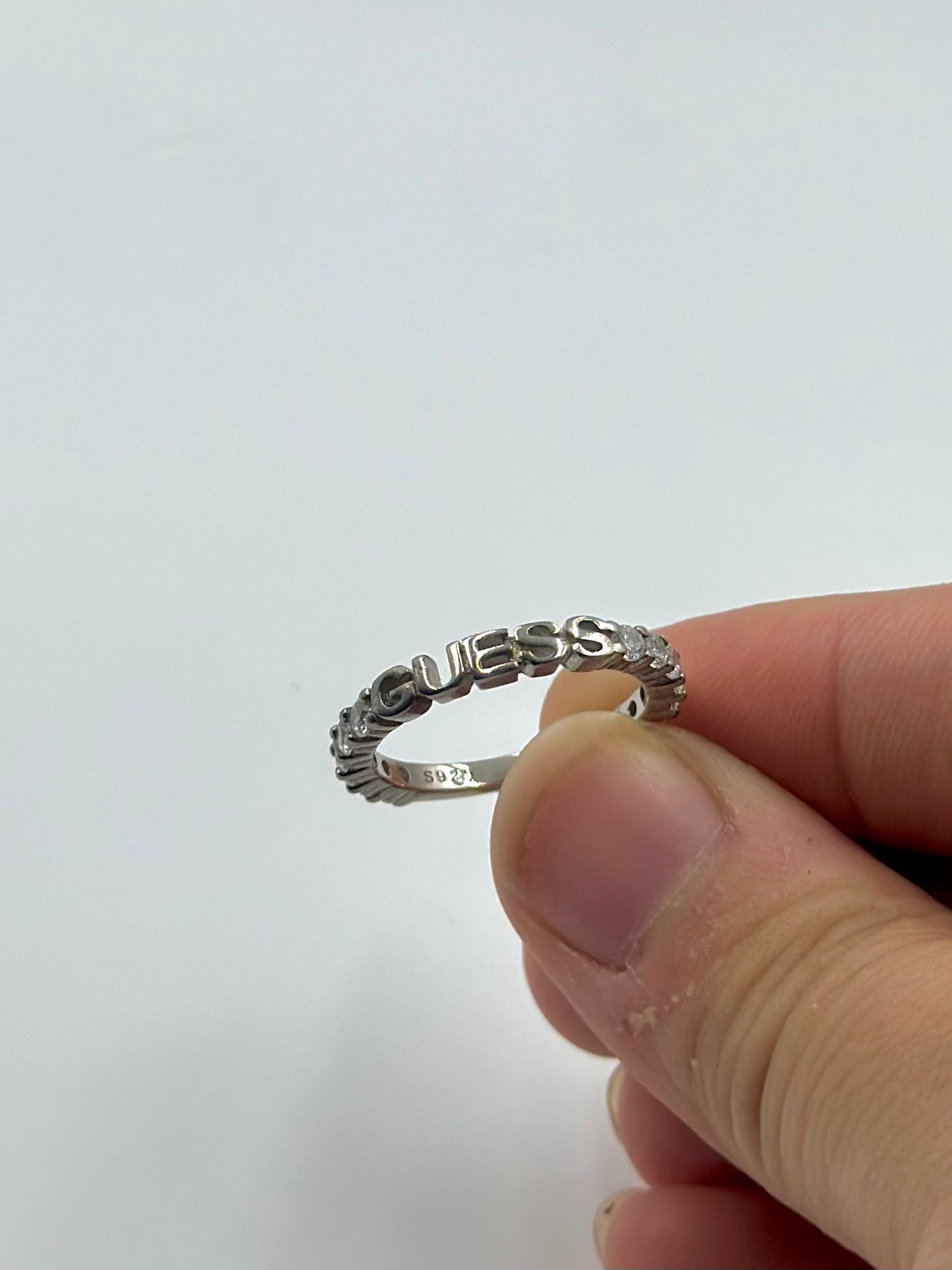 Zircon studded sterling silver band ring