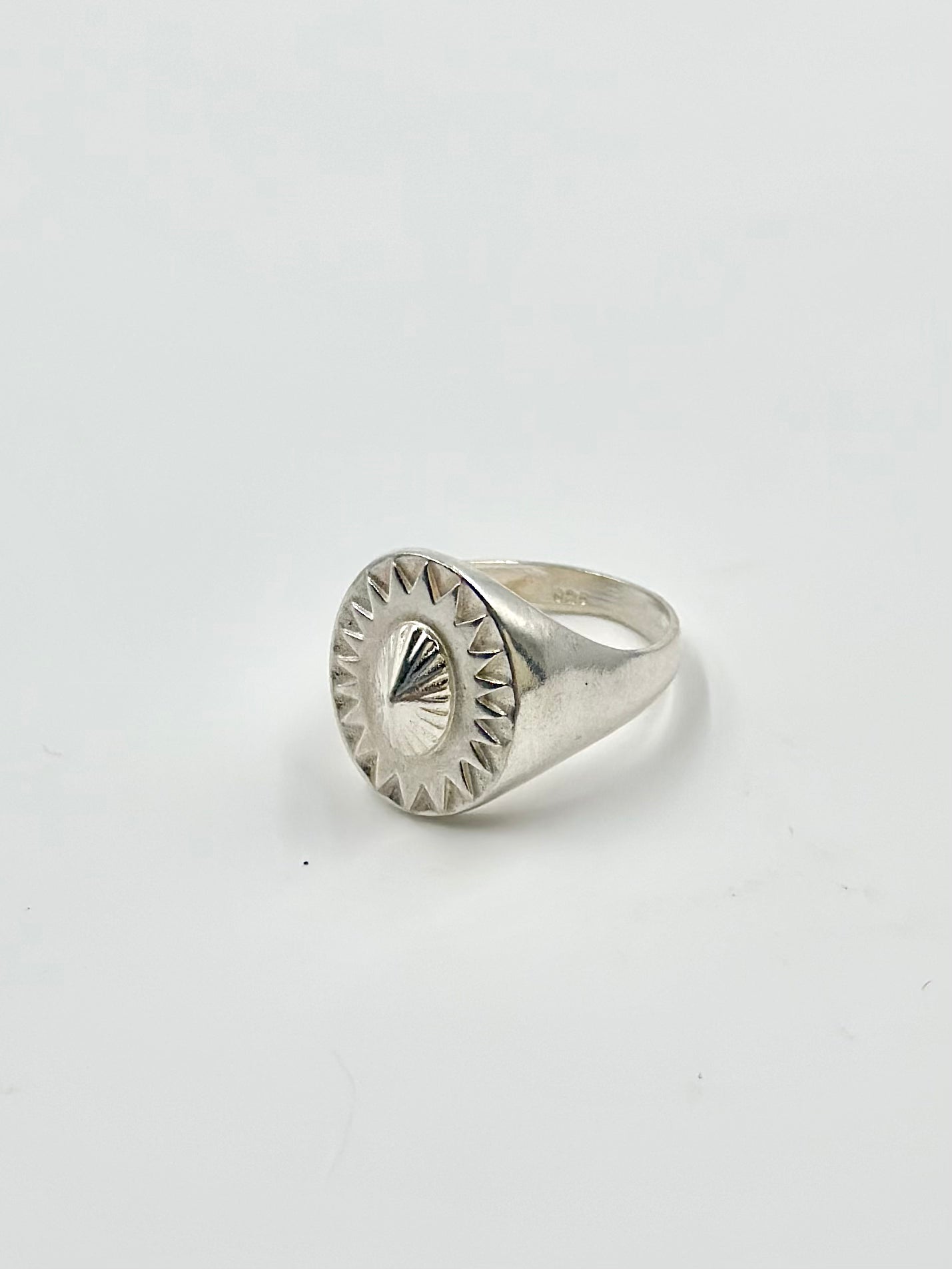 Round shaped sterling silver artisanal ring