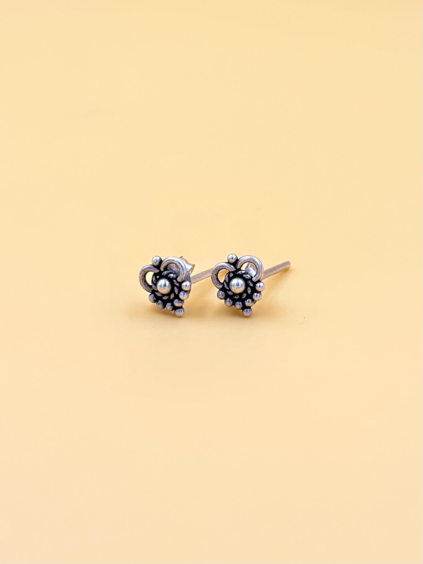 Oxidised, mini, daily wear studs in 92.5 sterling silver.