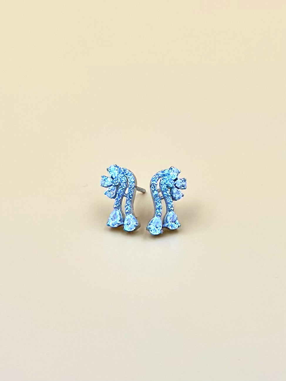 Zircon studded, flower shaped, sterling silver studs