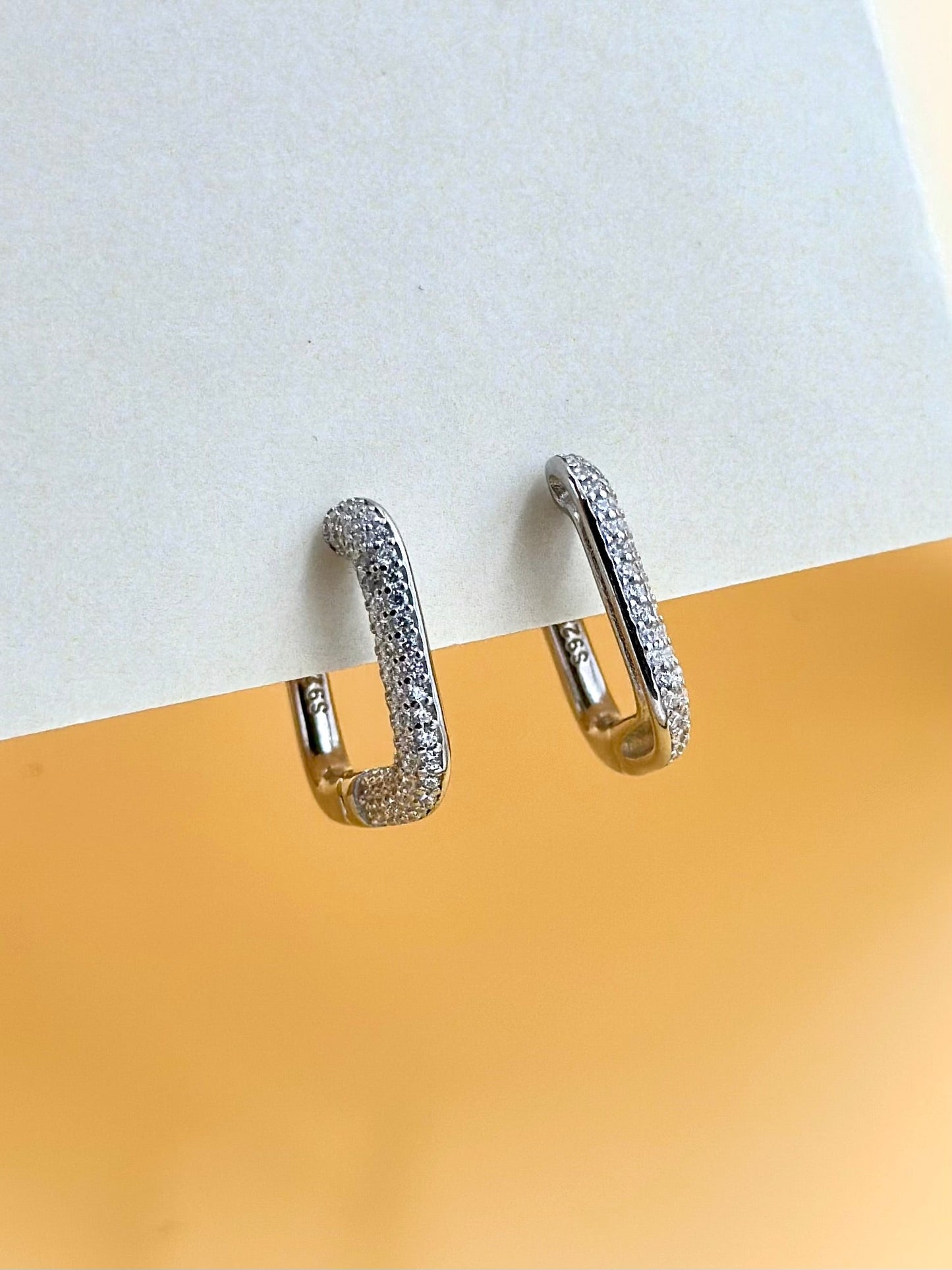 Square shaped sterling silver bali studded with zircon