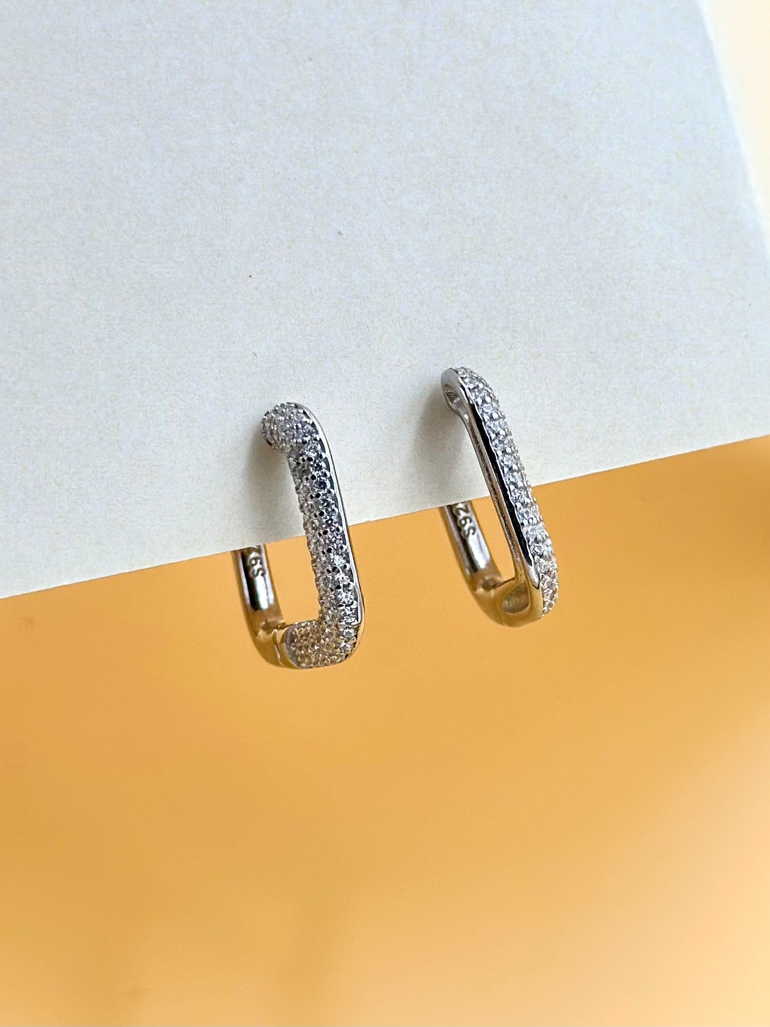 Square shaped sterling silver bali studded with zircon