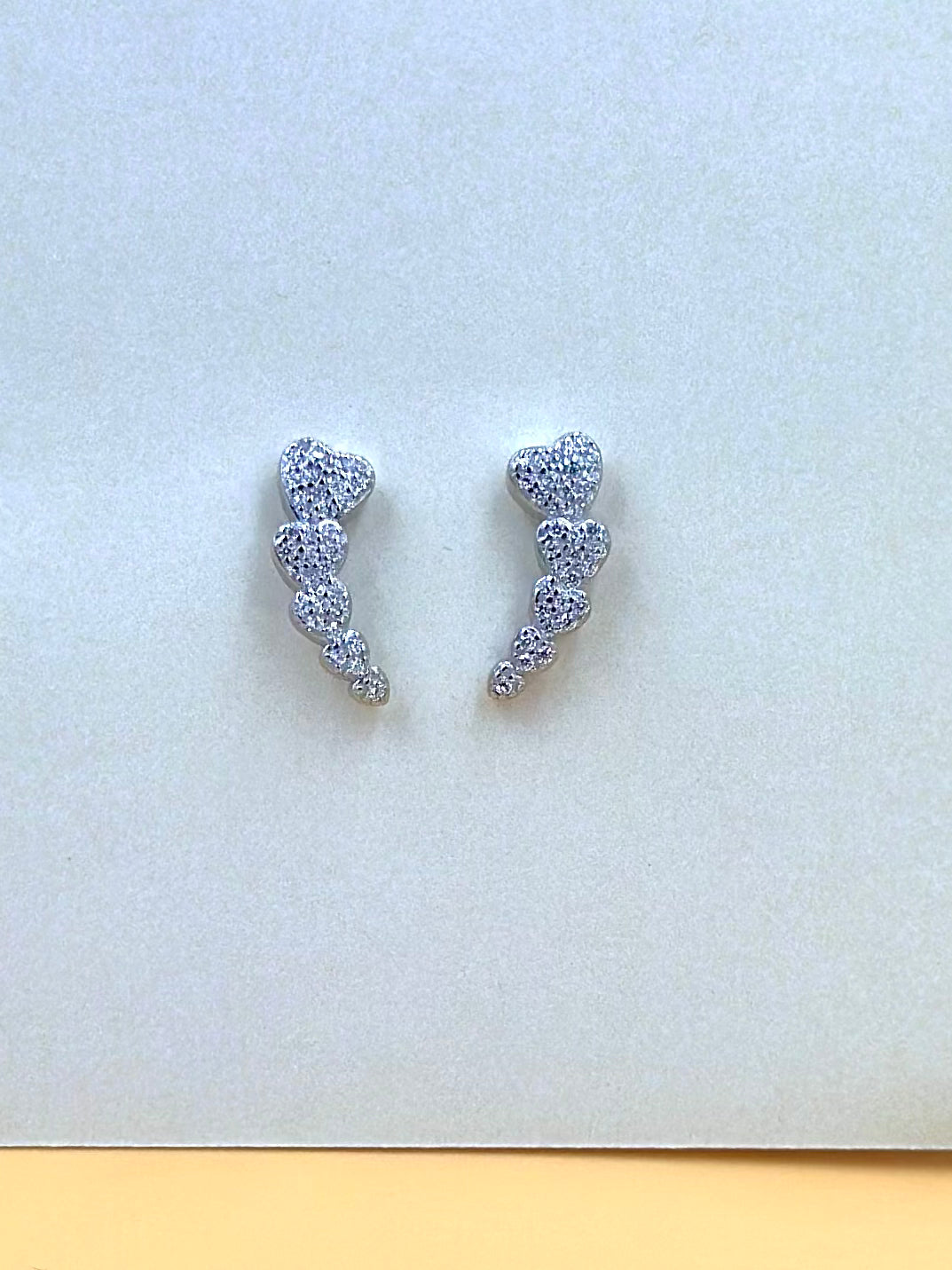 Zircon studded, hearts shaped drop earrings