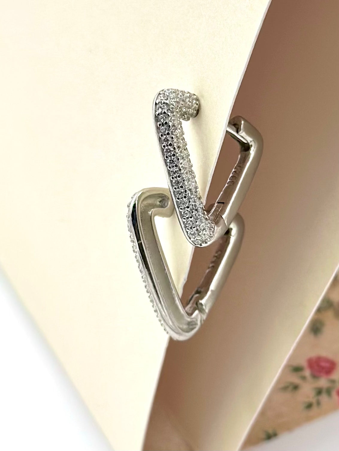 Triangle shaped sterling silver bali studded with zircon