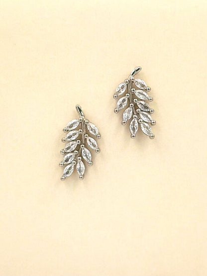 Sterling silver drop earrings in leaf shape, studded with zircon
