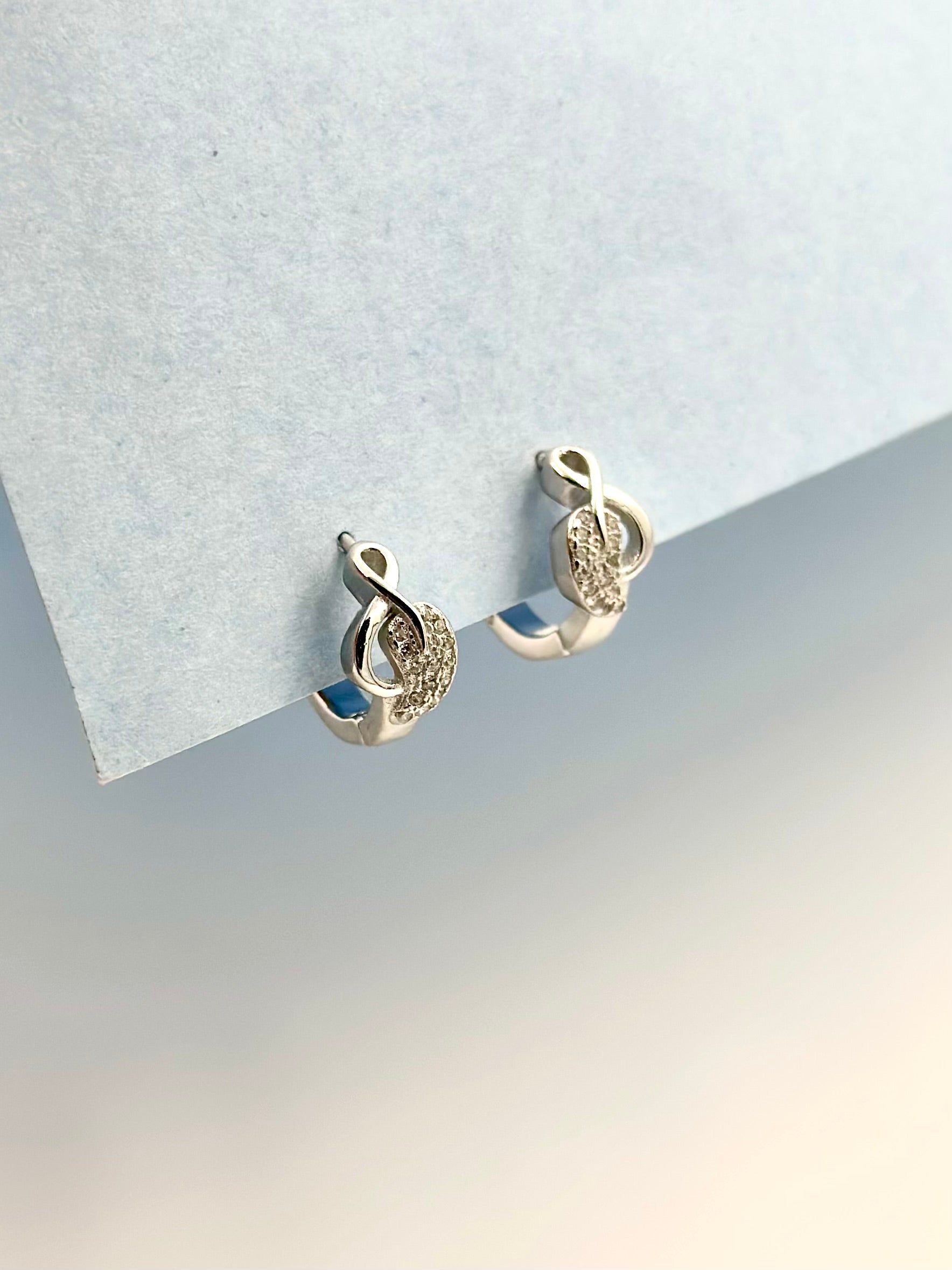 Zircon studded sterliing silver bali with infinity design 