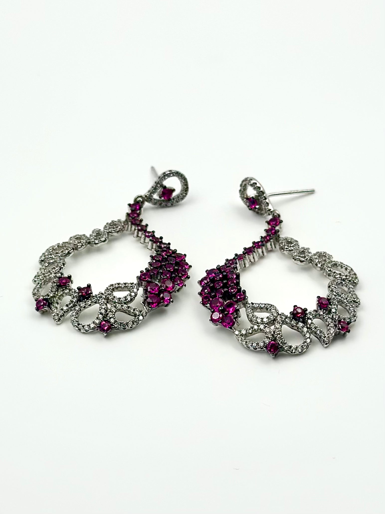 Zircon and fancy stones studded statement danglers in sterling silver