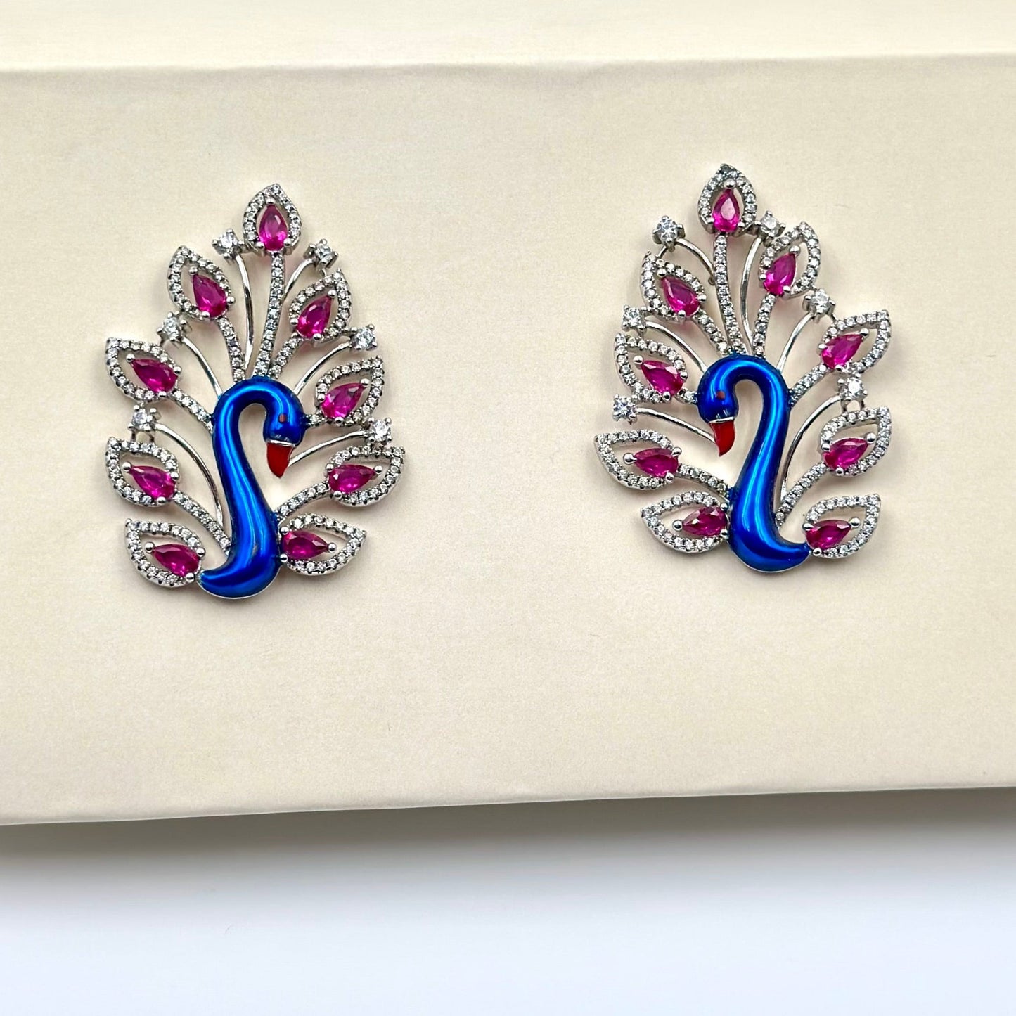 Zircon and ruby studded, peacock shaped studs