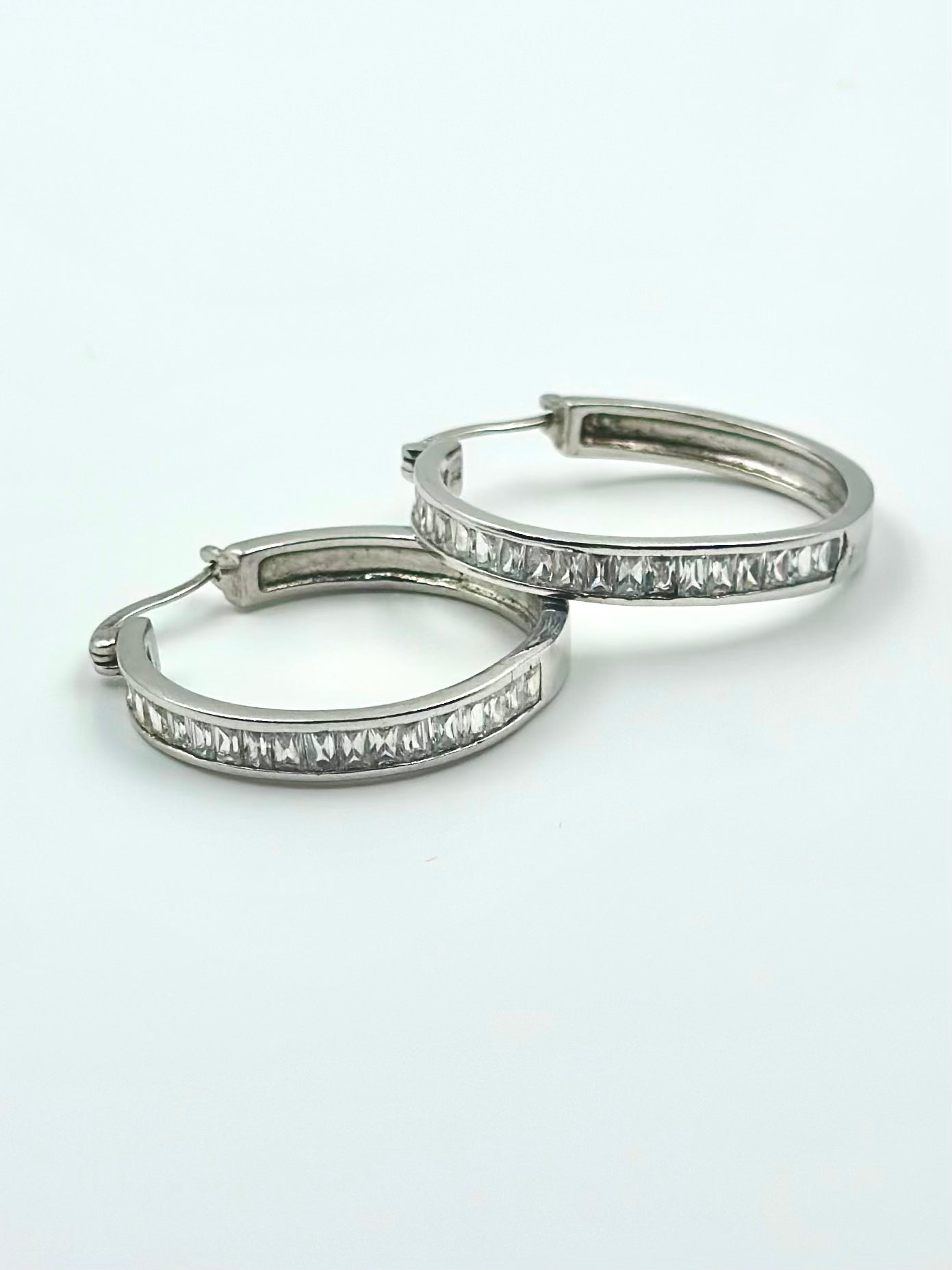 Modern Sterling silver hoops with ice like shine