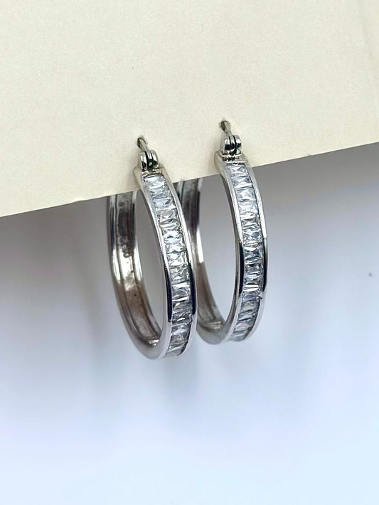 Modern Sterling silver hoops with ice like shine