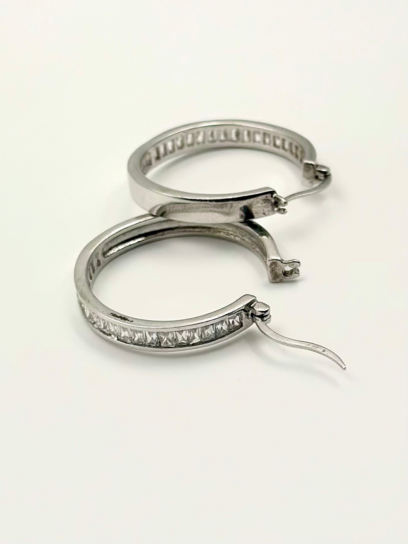 Modern Sterling silver hoops with ice like shine