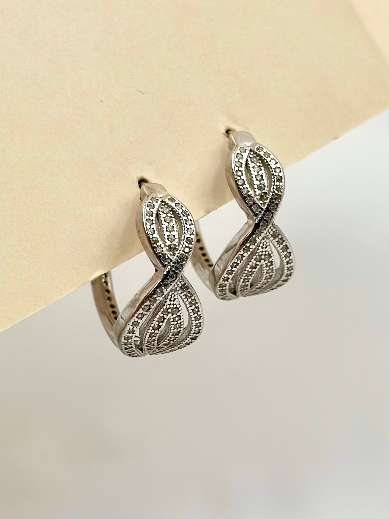 Zircon studded, infiniity shaped, twist bali in sterling silver