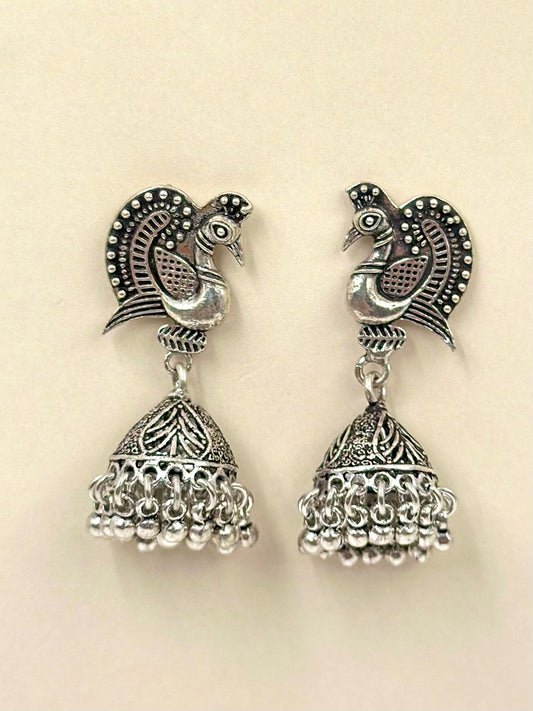 Majestic peacock shaped, oxidised sterling silver jhumkas with lined details