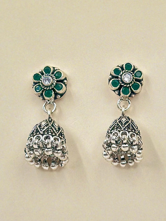 Green stones studded, flower shaped, oxidised sterling silver jhumkas